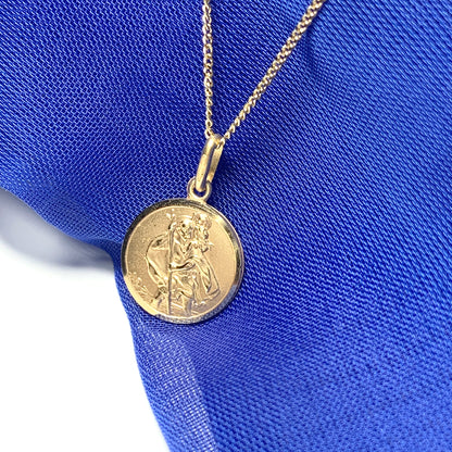 Solid round St. Christopher yellow gold