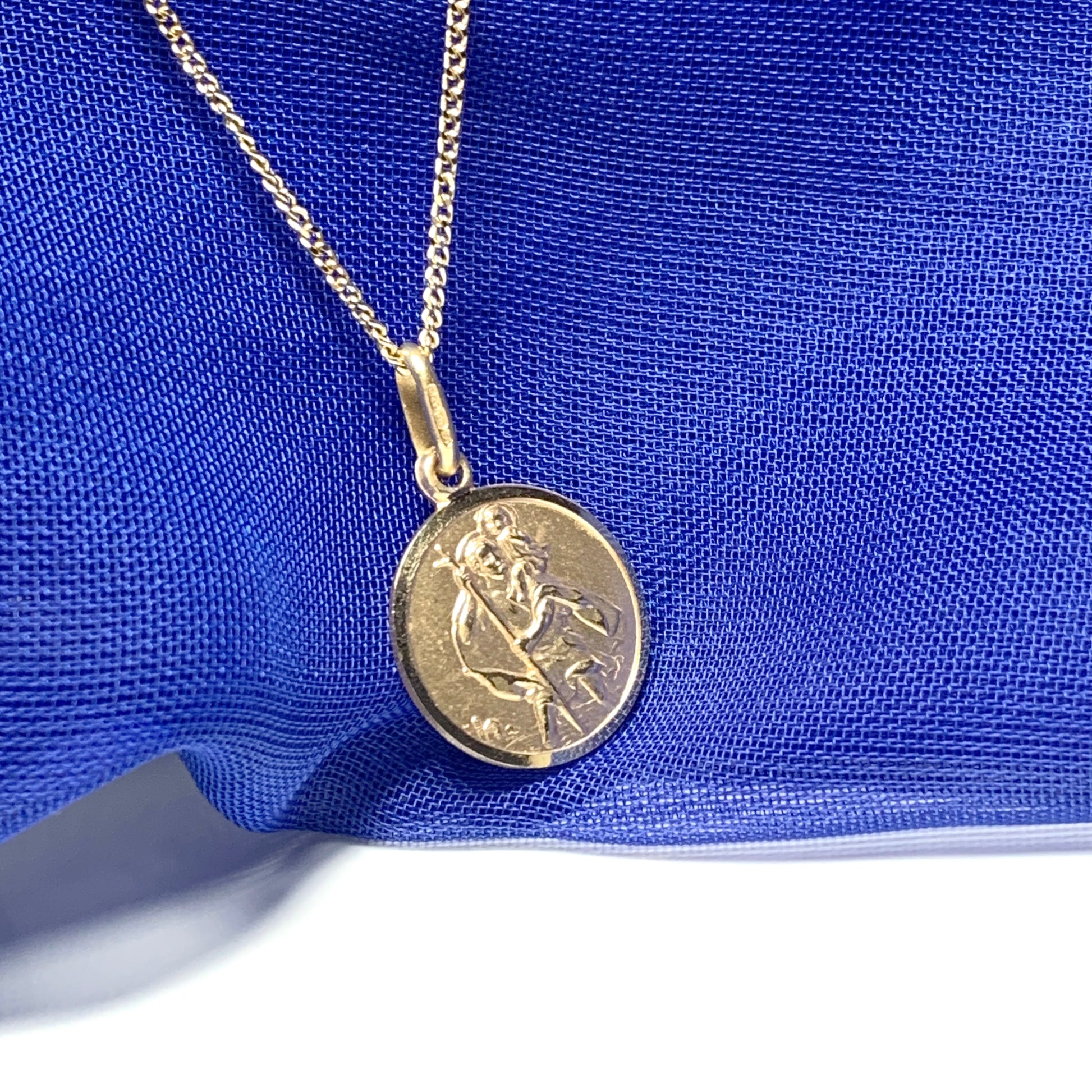 Solid round St. Christopher yellow gold