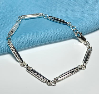 Ladies twisted sterling silver bracelet fancy patterned solid link