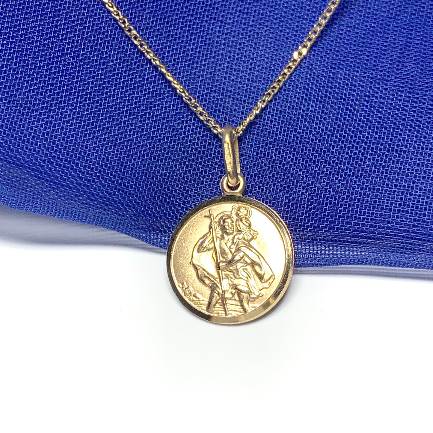 Solid round St. Christopher yellow gold