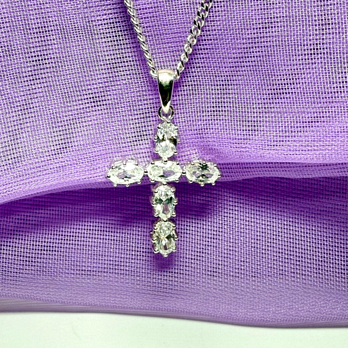 Sparkling fancy cubic zirconia set sterling silver cross with chain