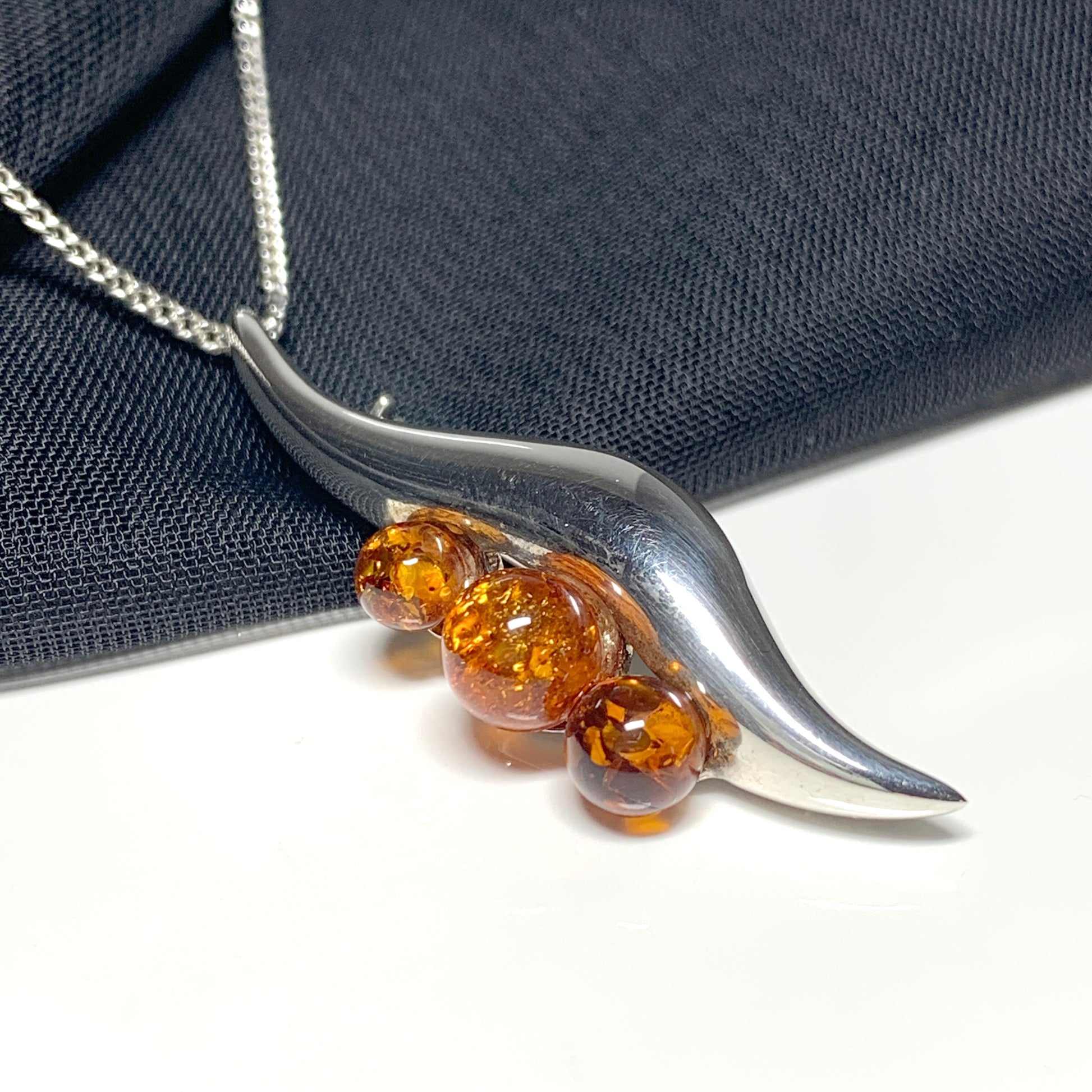 Sterling Silver Amber Swirl Necklace