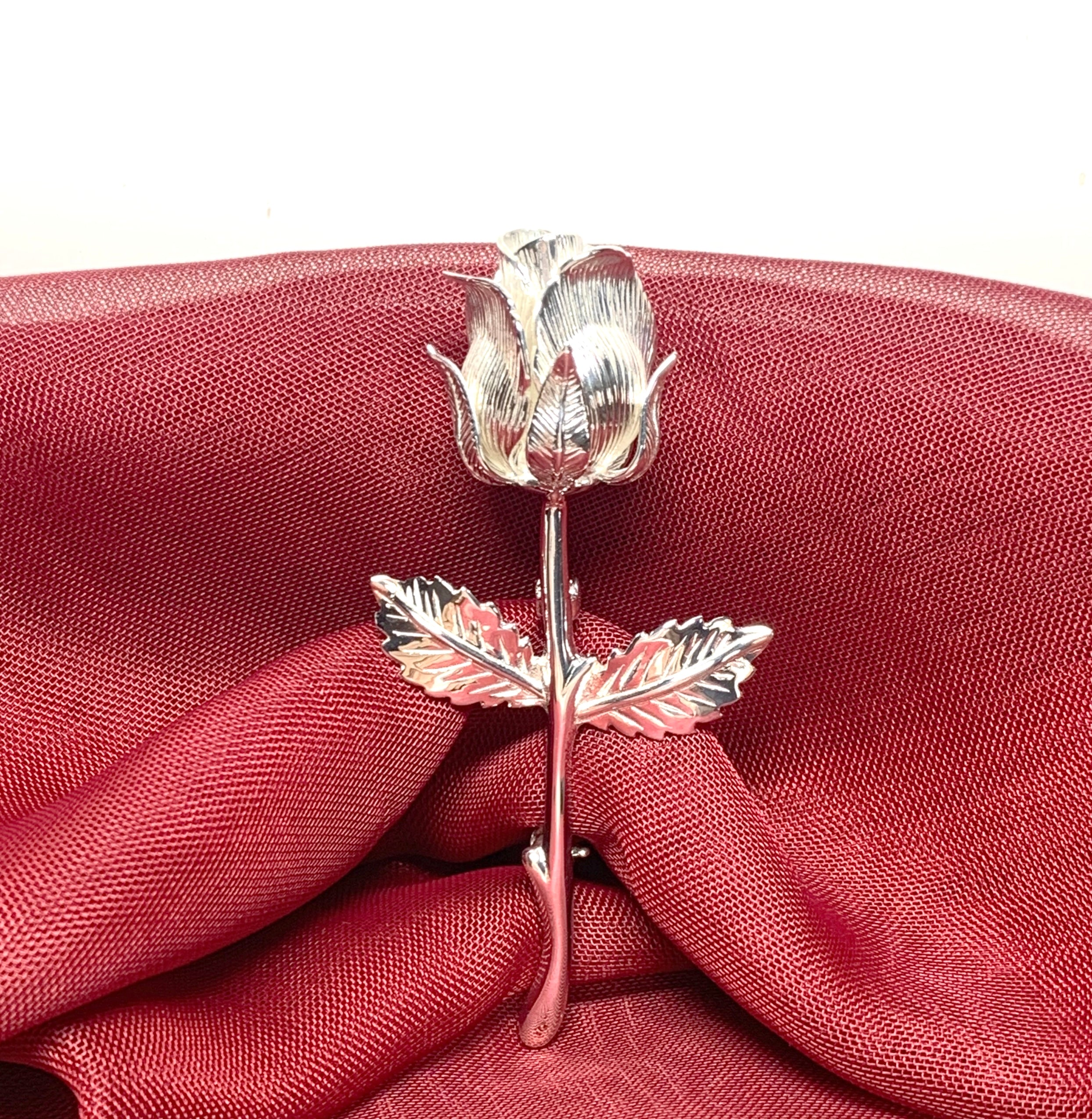 Silver hot sale rose brooch