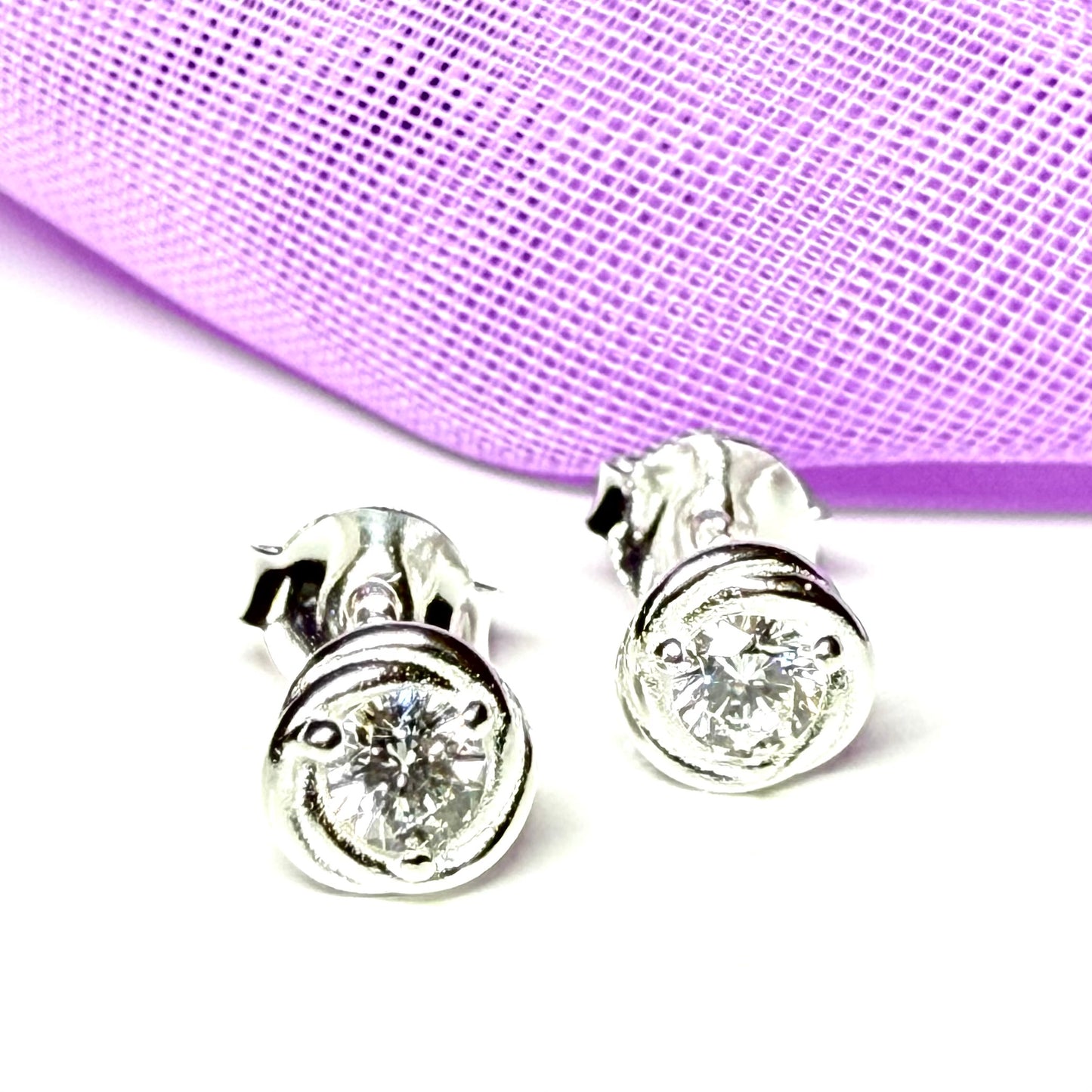 Sterling Silver Round Twisted Edge Cubic Zirconia Stud Earrings