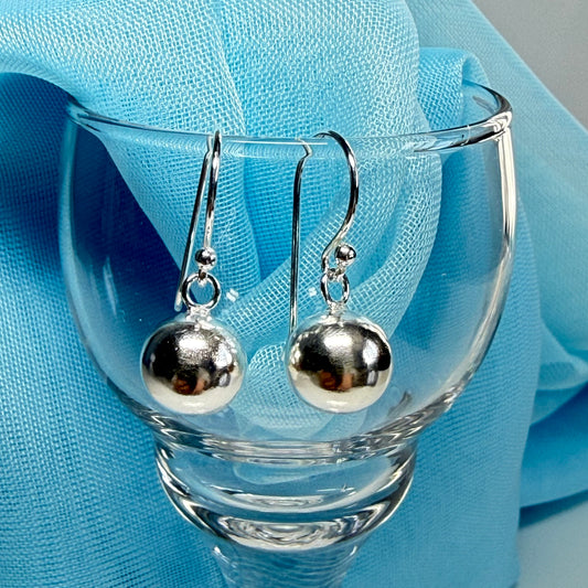 Sterling silver ball shaped drop earrings
