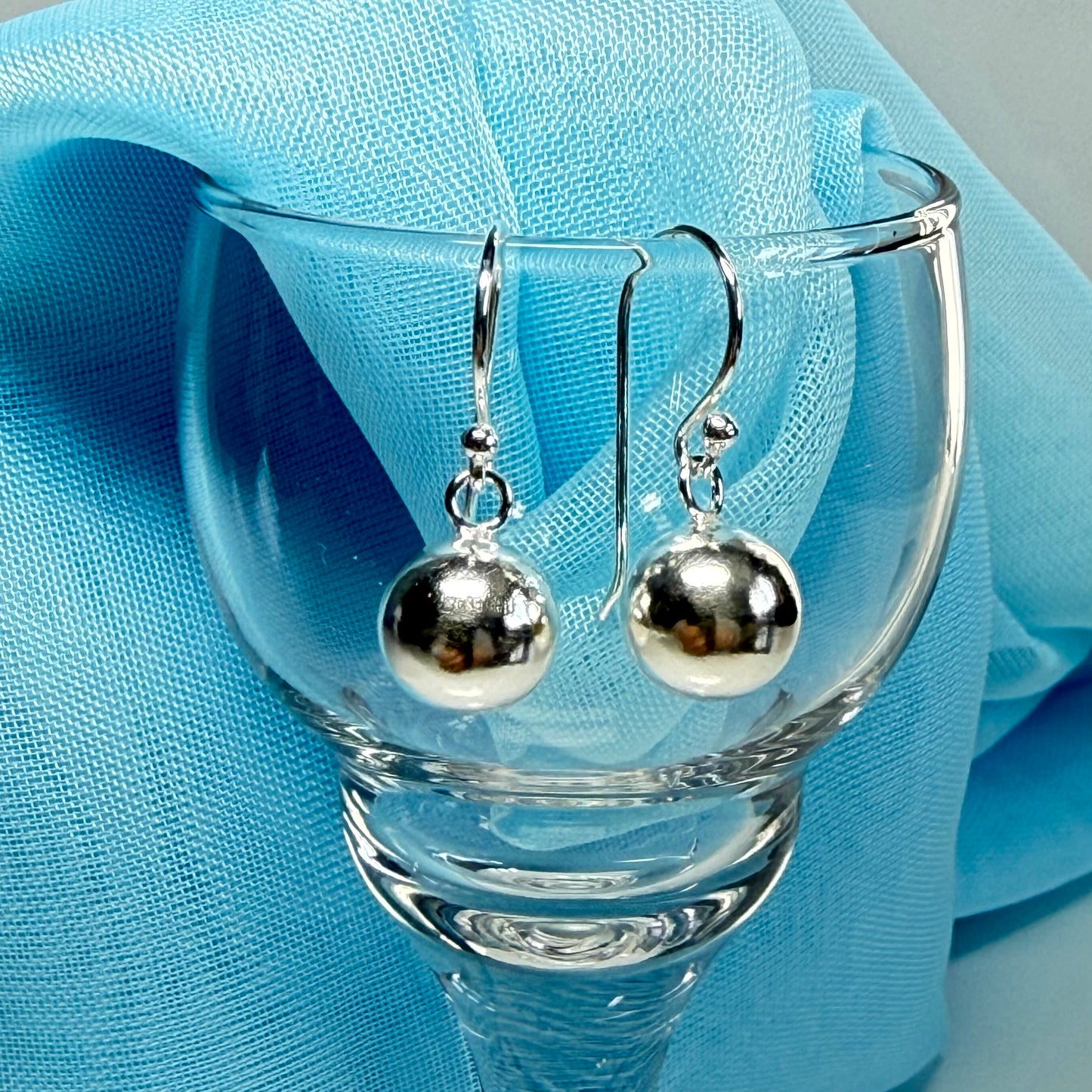 Sterling silver ball shaped drop earrings