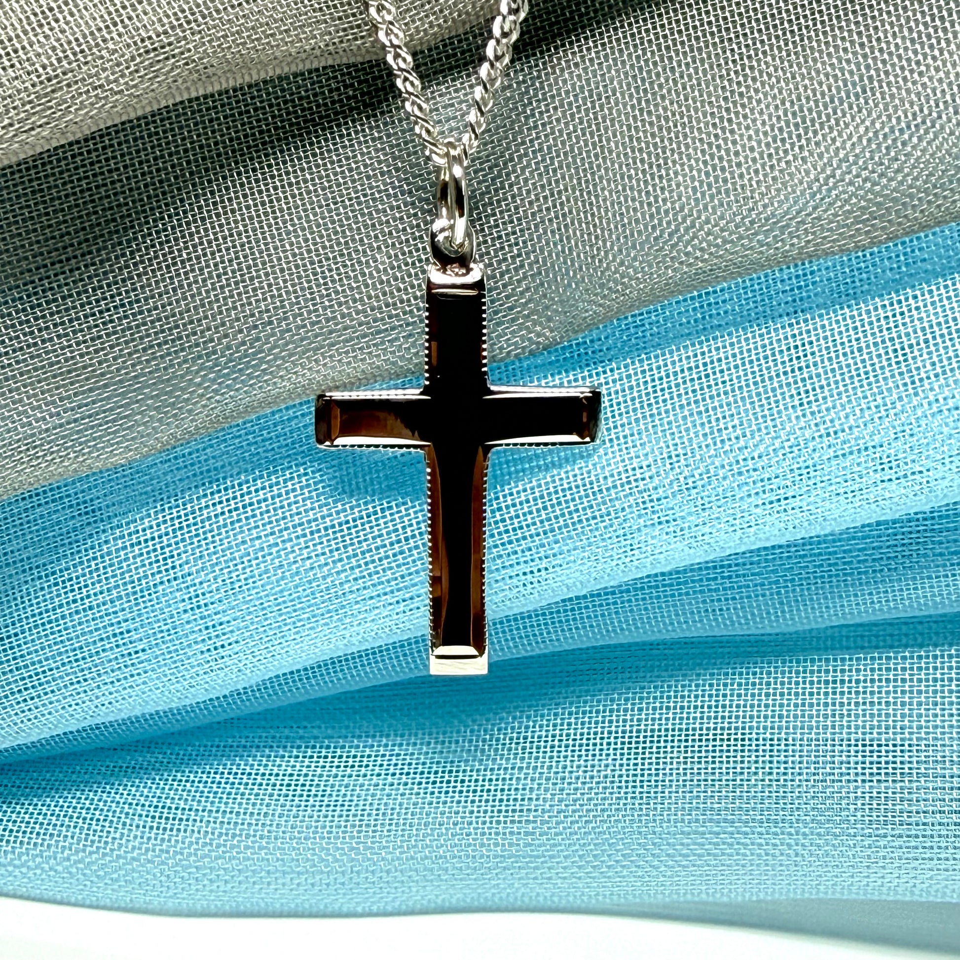 Sterling silver beaded edged solid cross with chain