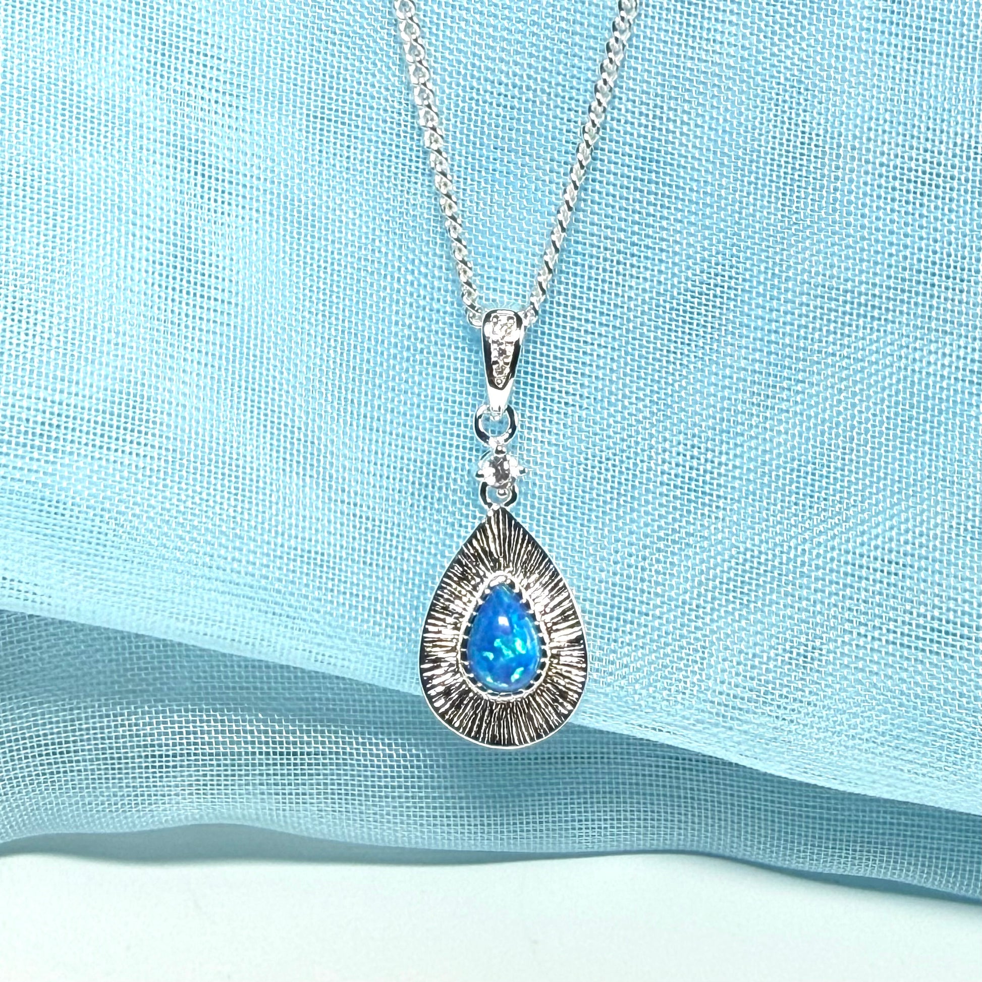 Sterling silver blue opal teardrop necklace