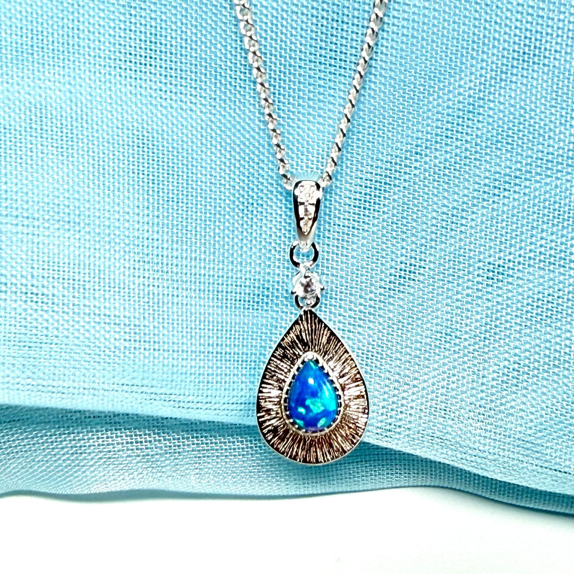 Sterling silver blue opal teardrop necklace