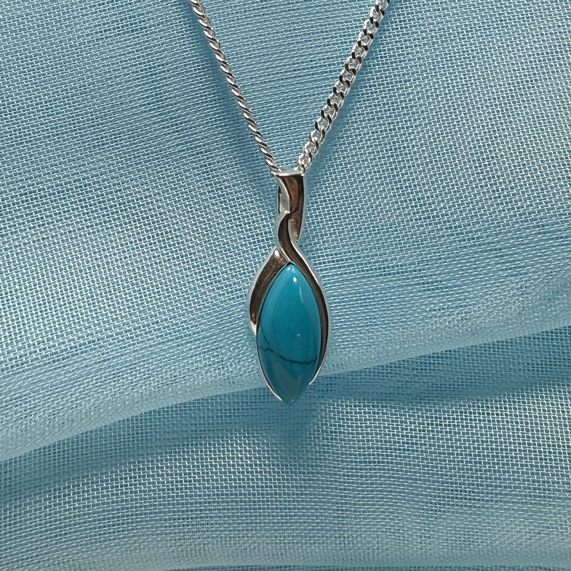 Sterling silver blue turquoise marquise shape necklace twisted pendant with a chain
