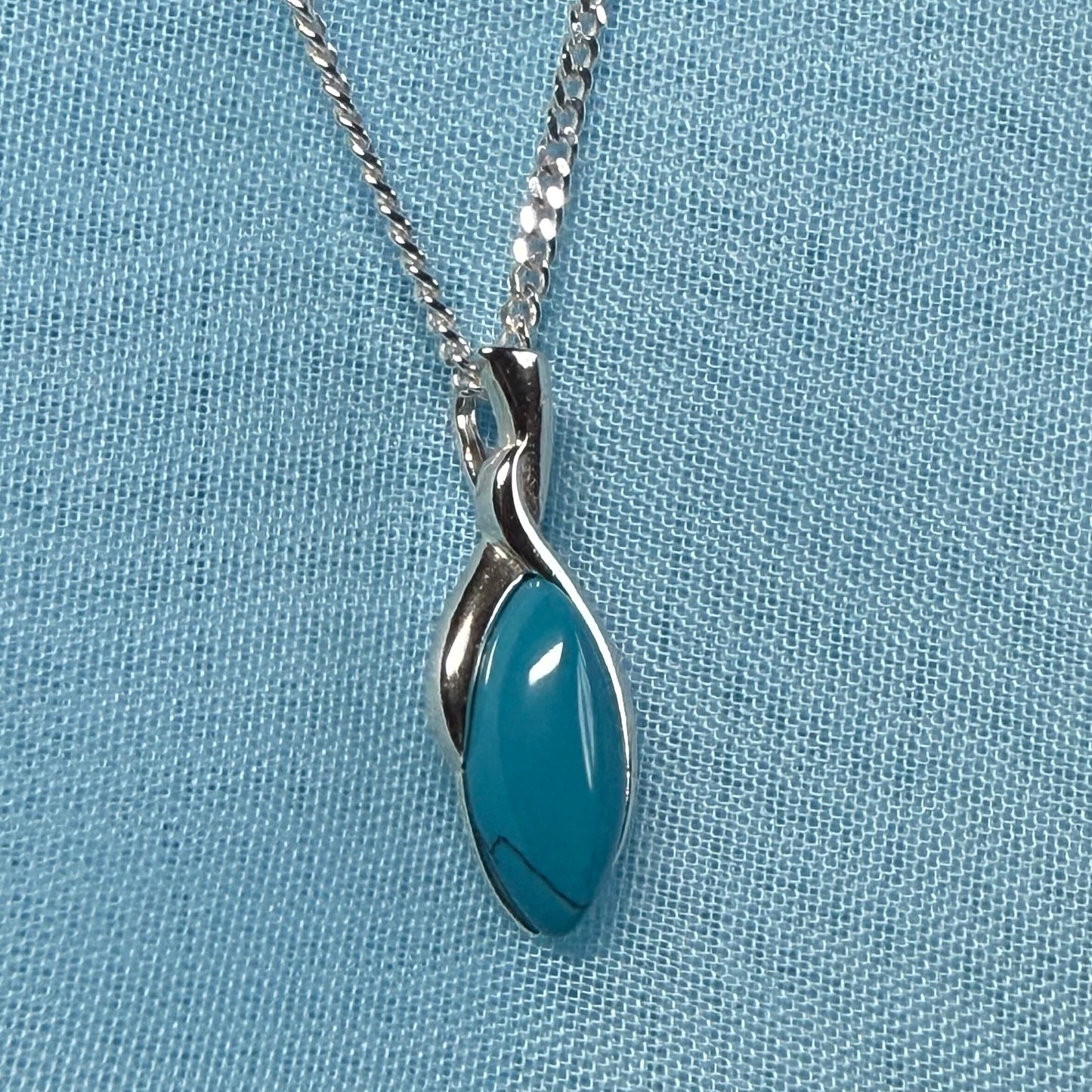 Sterling silver blue turquoise pear shape necklace open teardrop shaped pendant with a chain included