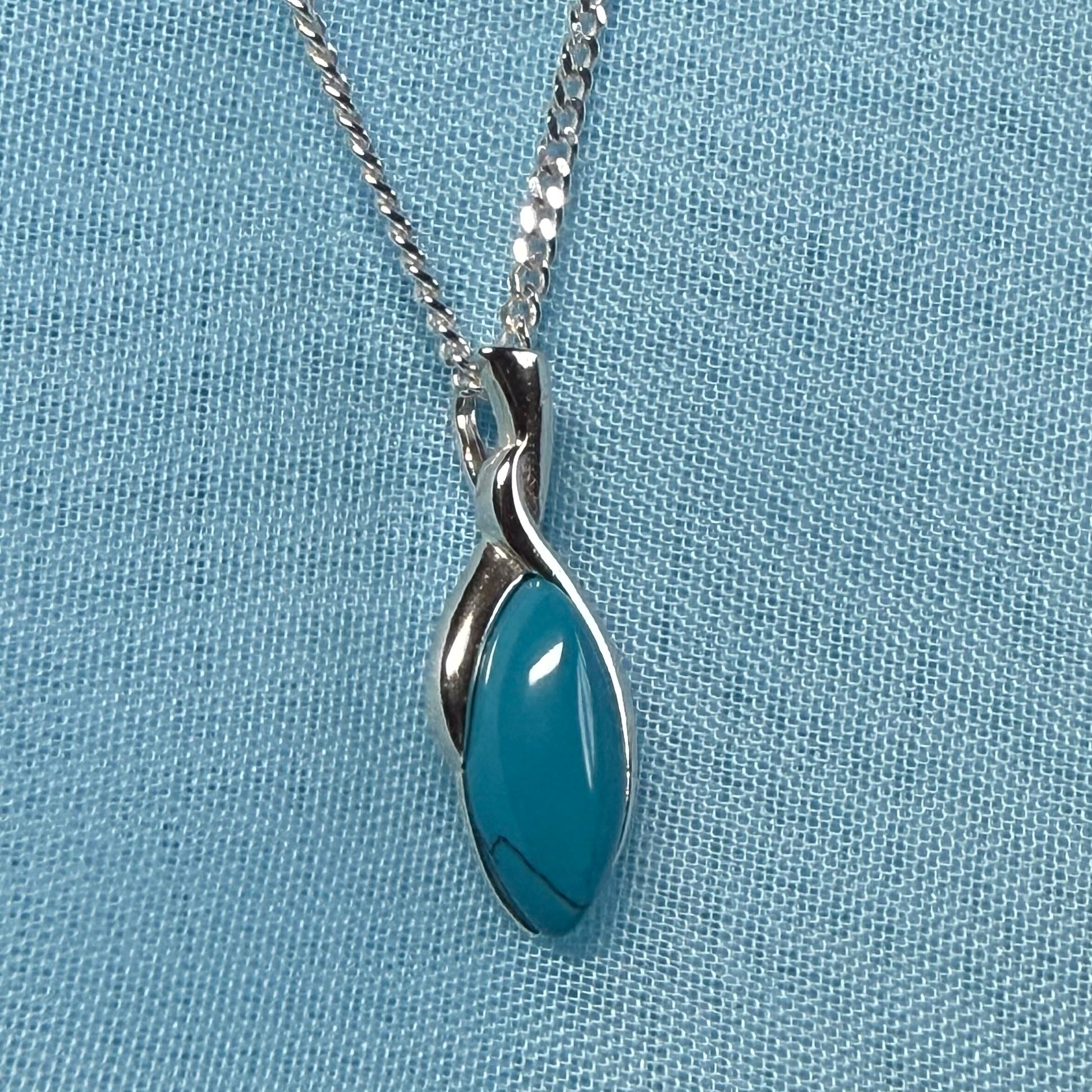 Sterling silver blue turquoise pear shape necklace open teardrop shaped pendant with a chain included