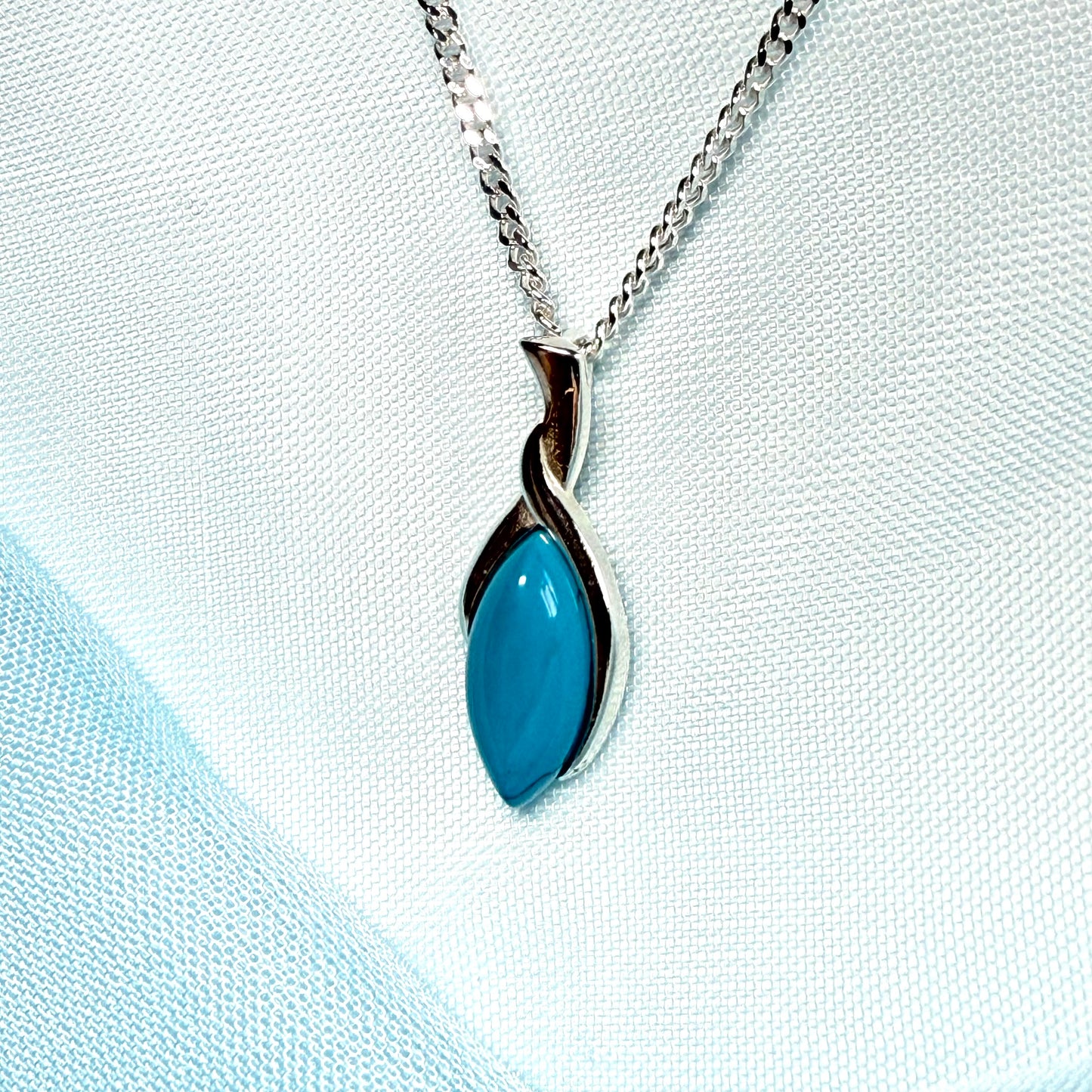 Sterling silver blue turquoise pear shape necklace open teardrop shaped pendant with a chain included