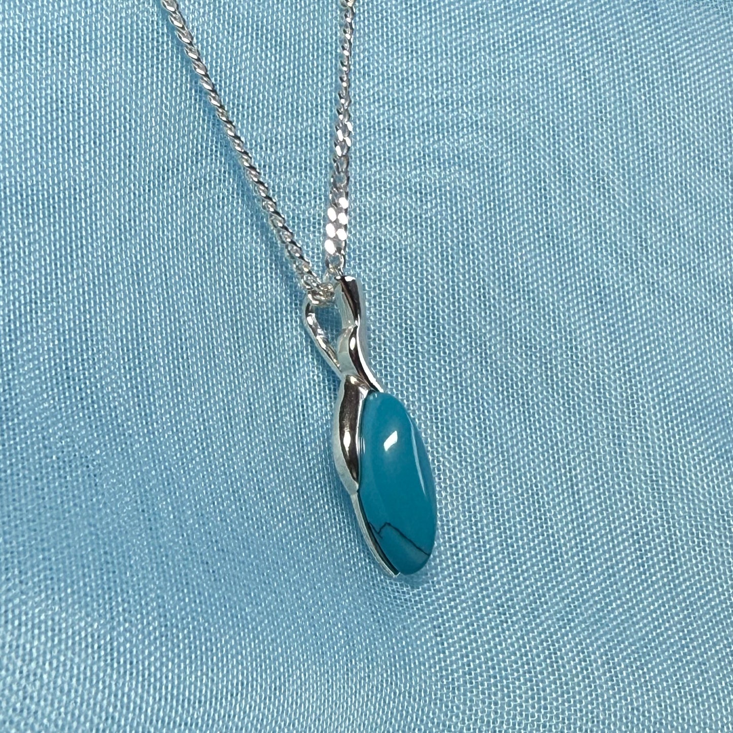 Sterling silver blue turquoise pear shape necklace open teardrop shaped pendant with a chain included
