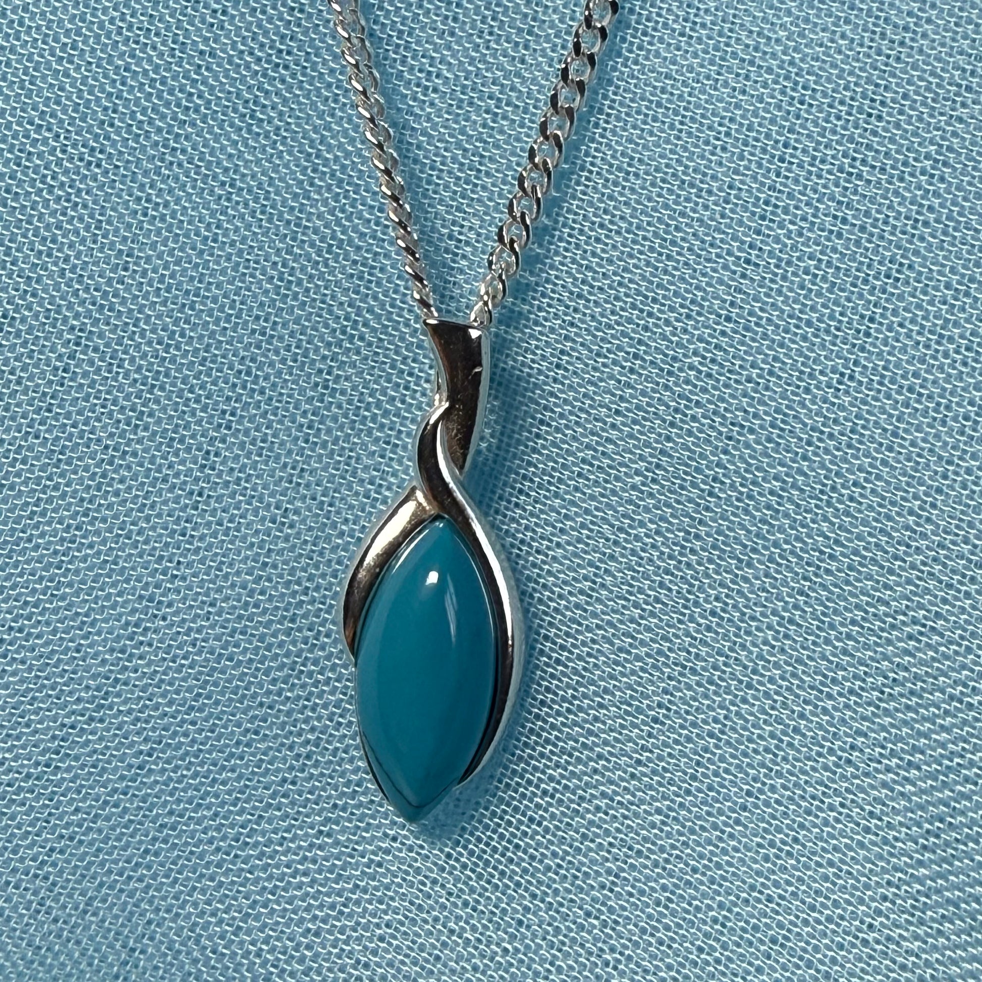 Sterling silver blue turquoise pear shape necklace open teardrop shaped pendant with a chain included