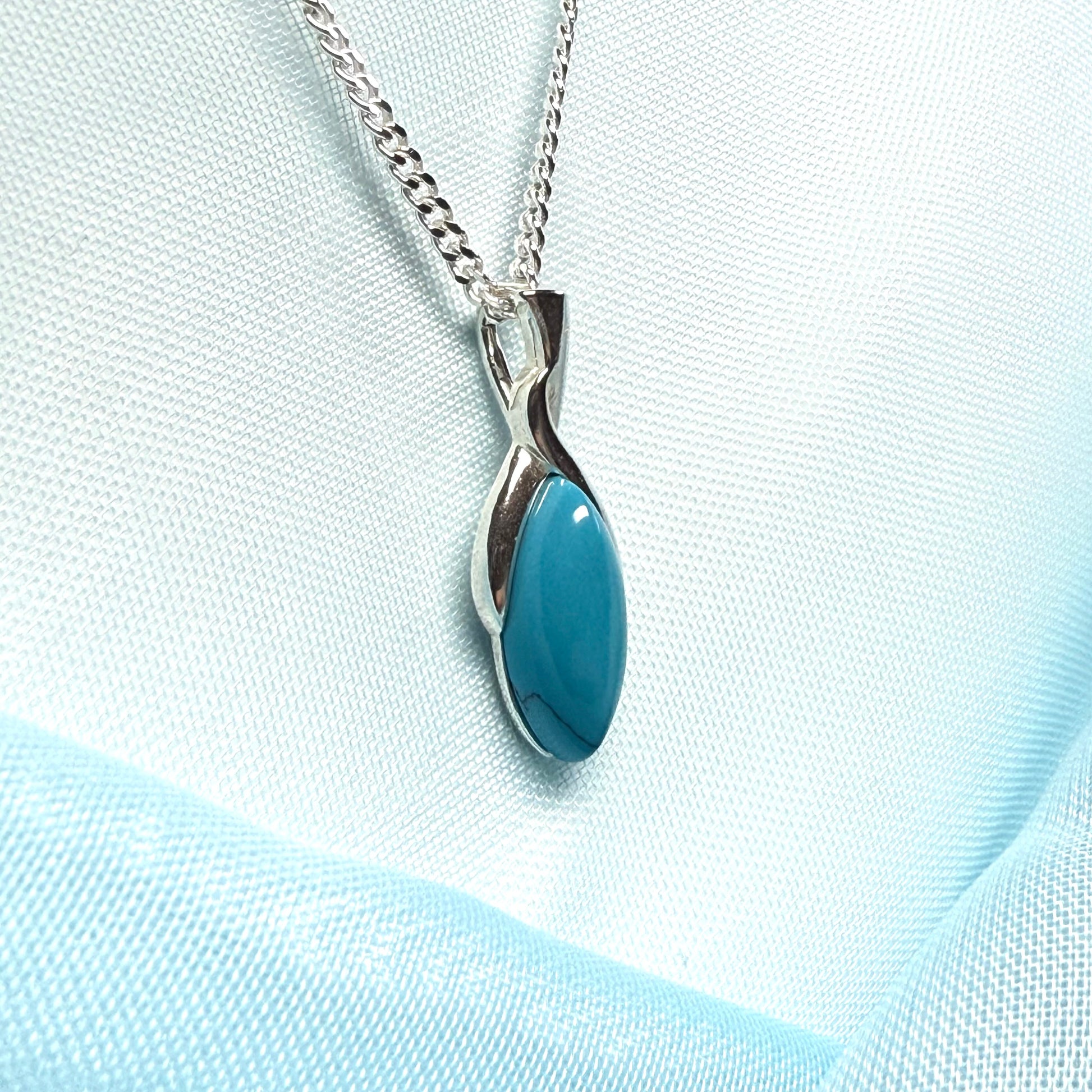 Sterling silver blue turquoise pear shape necklace open teardrop shaped pendant with a chain included