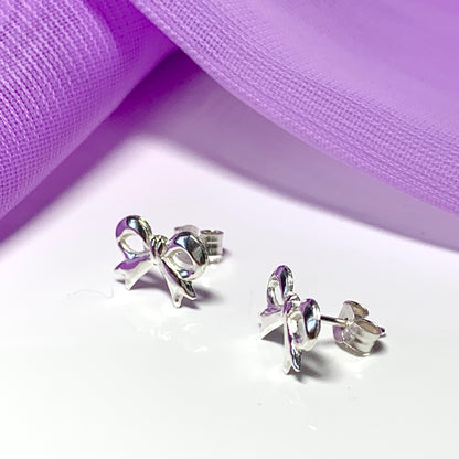 Sterling silver bow shaped stud earrings