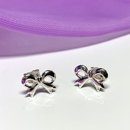 Sterling silver bow shaped stud earrings