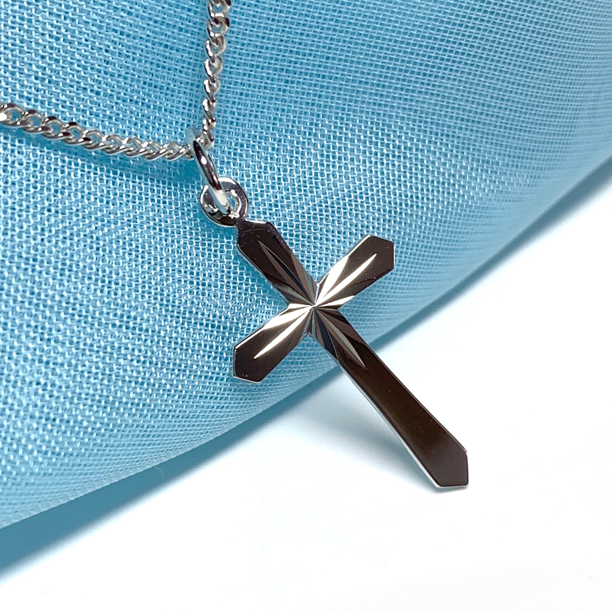 Sterling silver diamond cut cross necklace including chain