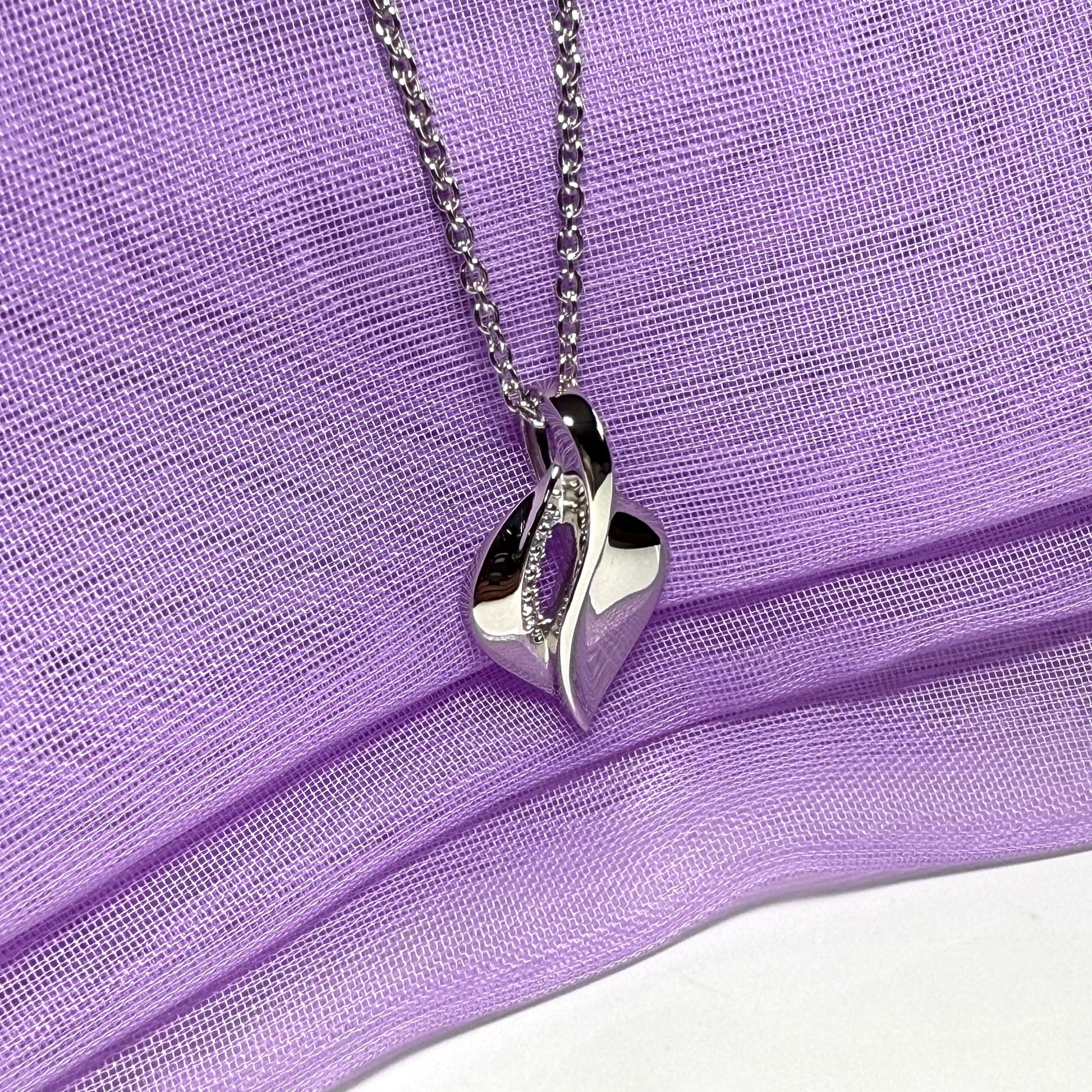 Sterling silver necklace swirl teardrop shaped cubic zirconia pendant