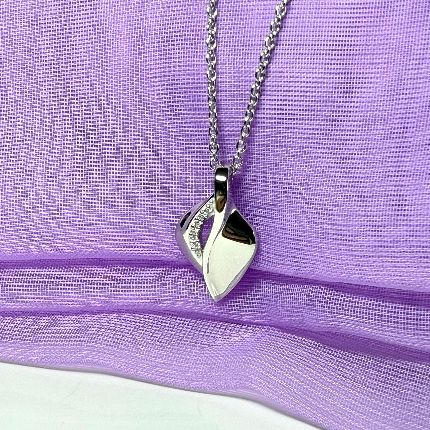 Sterling silver necklace swirl teardrop shaped cubic zirconia pendant