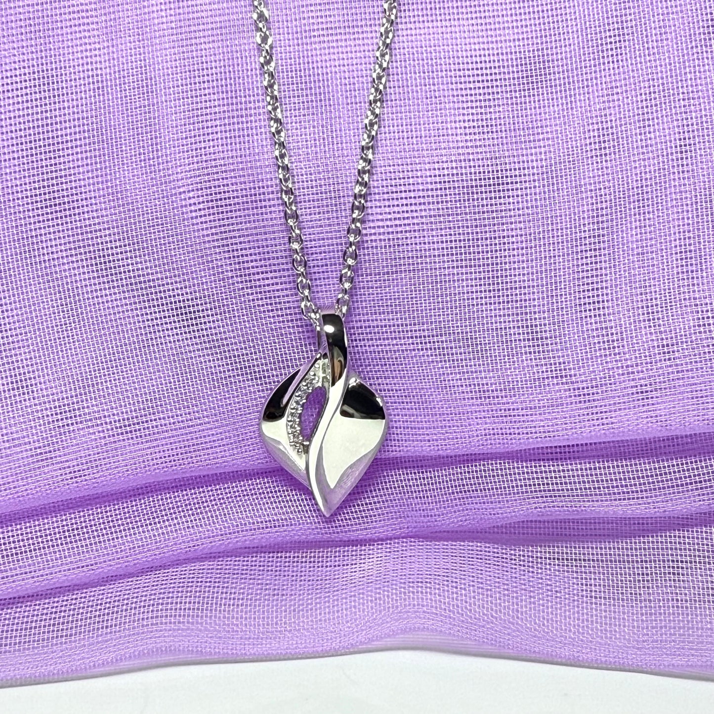 Sterling silver necklace swirl teardrop shaped cubic zirconia pendant