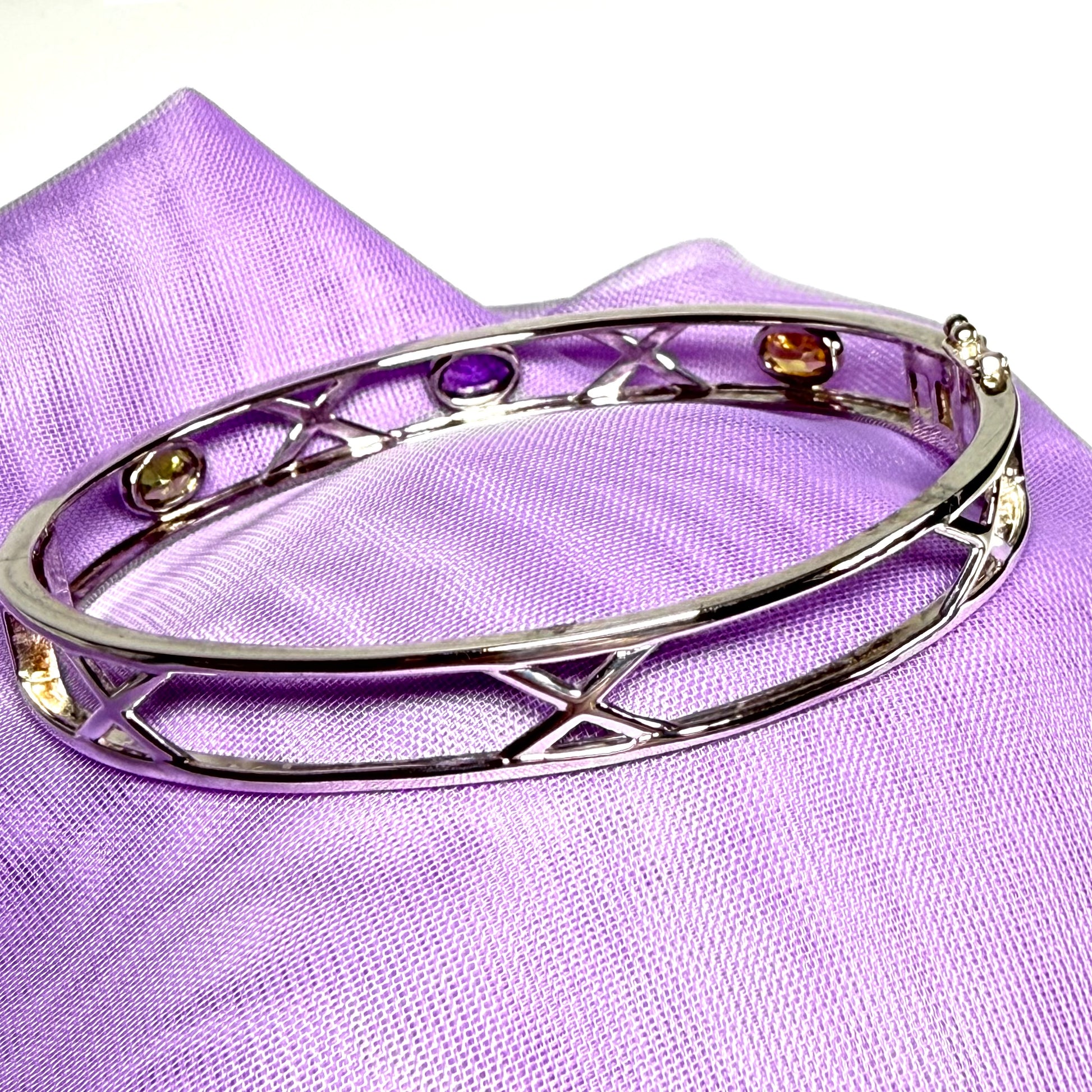 Sterling silver oval real peridot, real amethyst and real citrine, purple, green and yellow open pierced kiss bangle