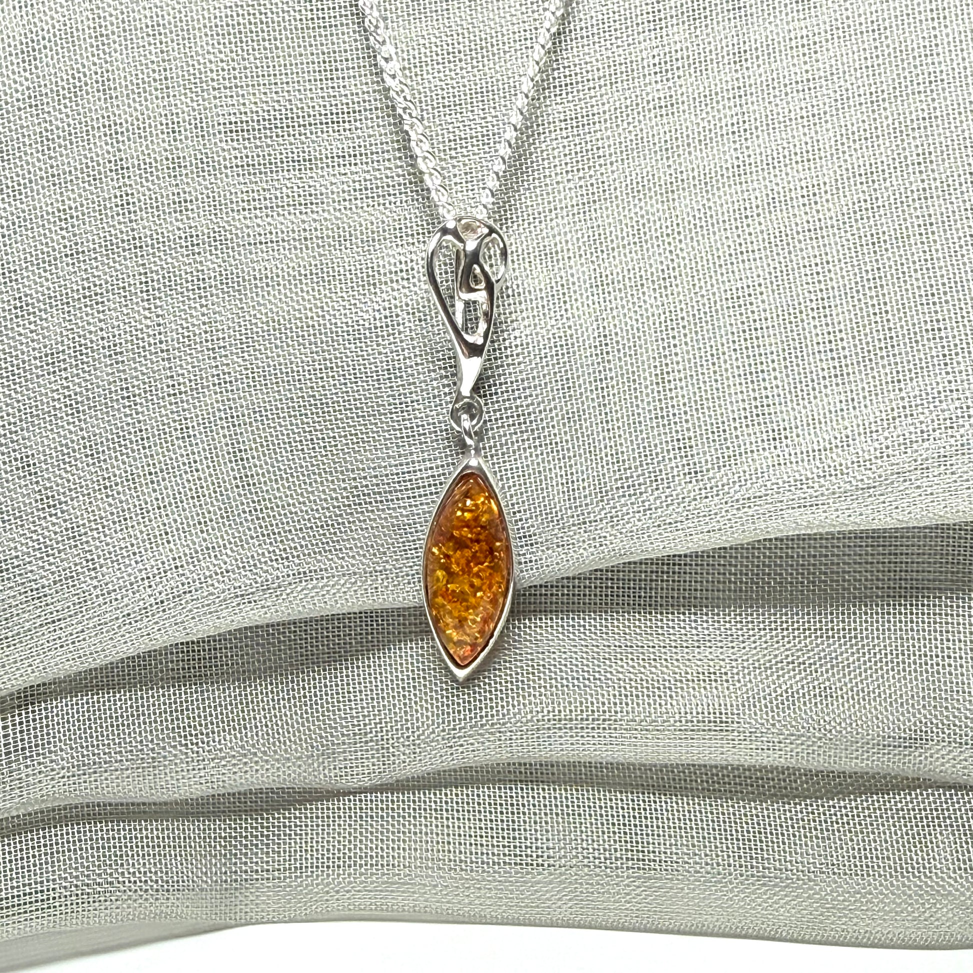 Sterling silver real amber marquise shaped necklace swirled open swirl pendant