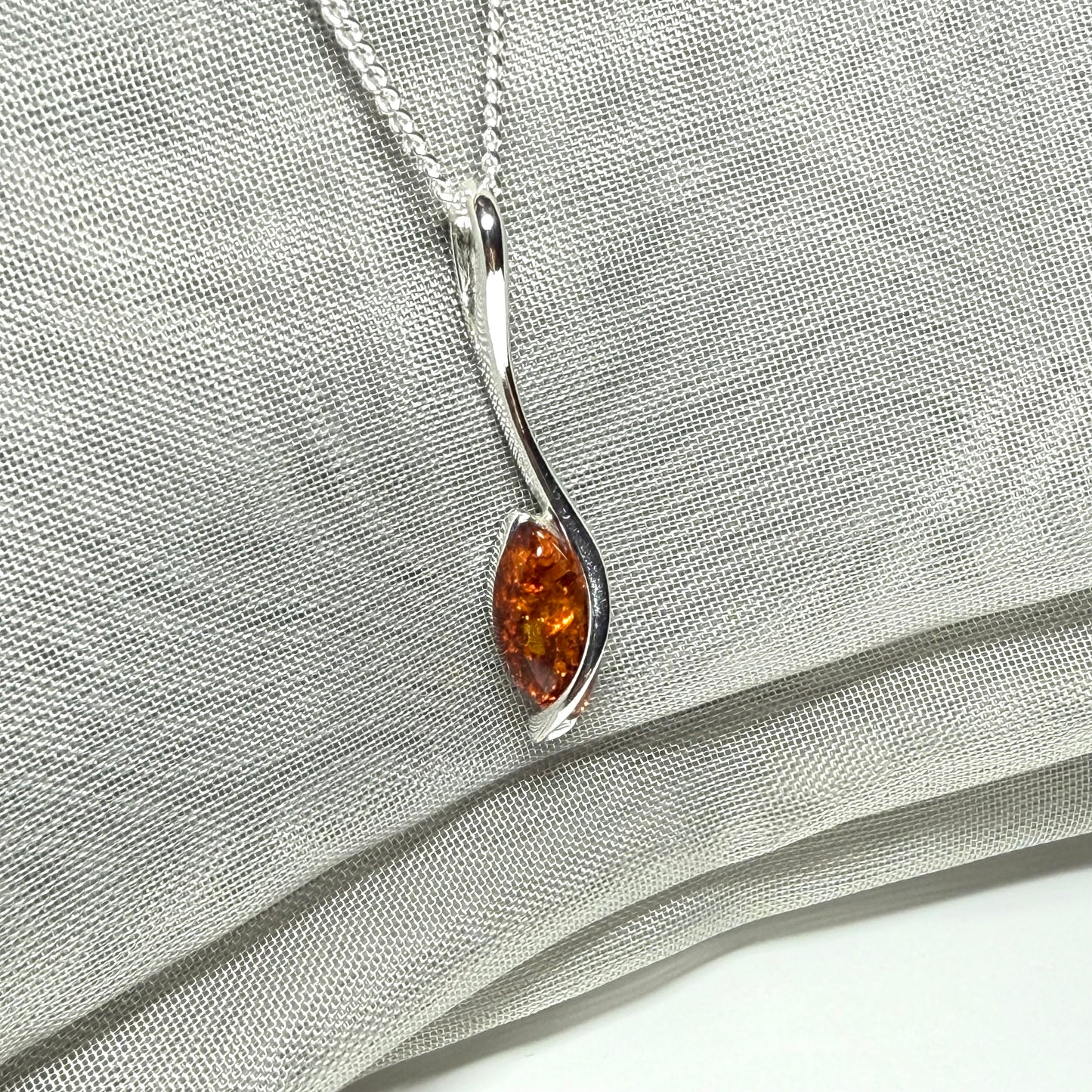 Sterling silver real amber marquise shaped necklace swirled pendant