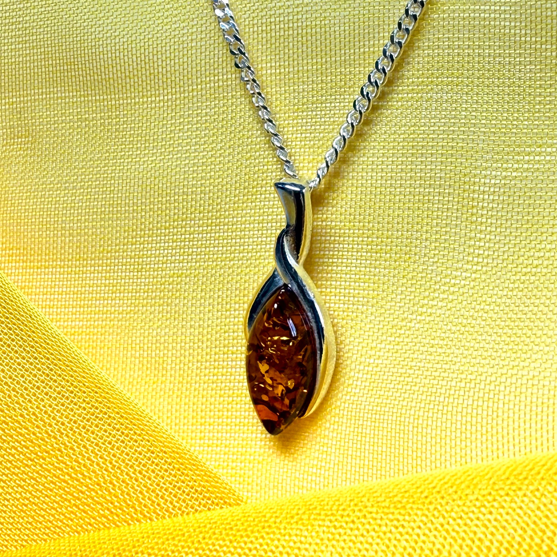 Sterling silver real amber marquise shaped necklace twisted marquise shaped pendant with a chain