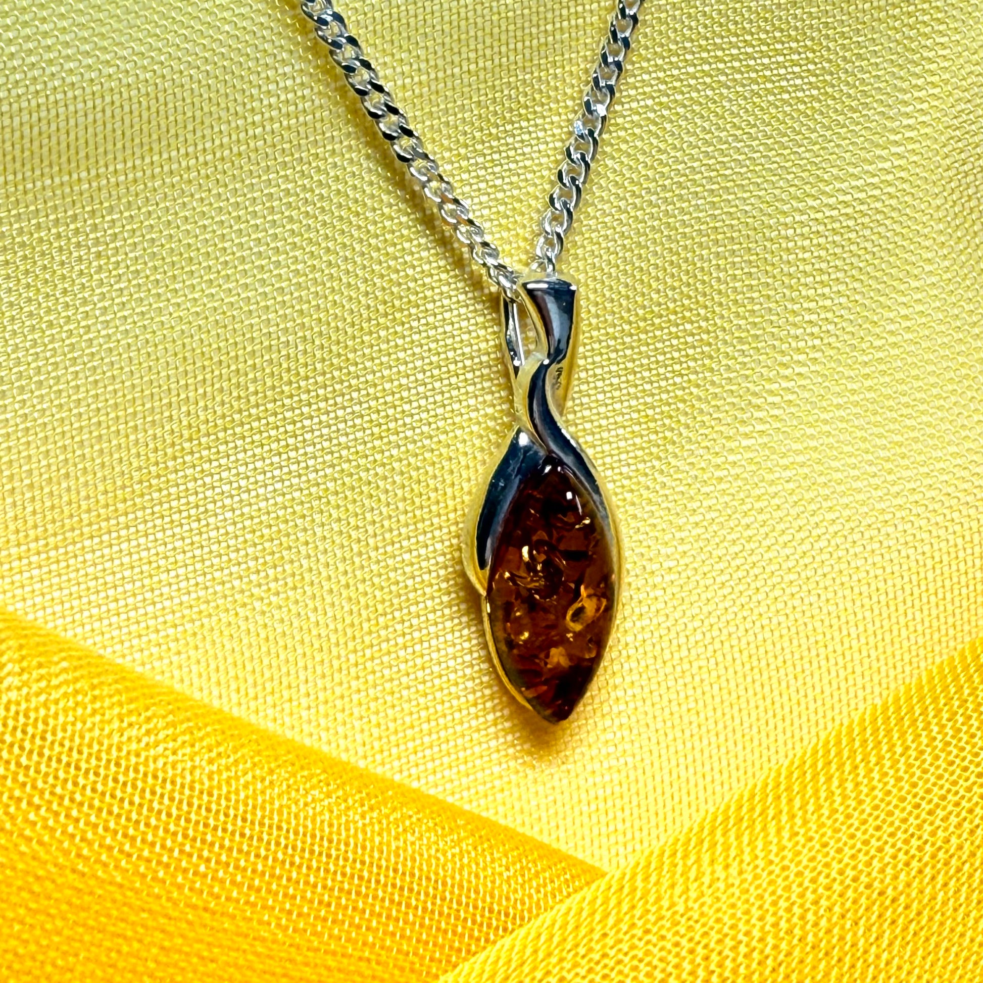 Sterling silver real amber pear shaped necklace open teardrop shaped pendant with a chain swirl design