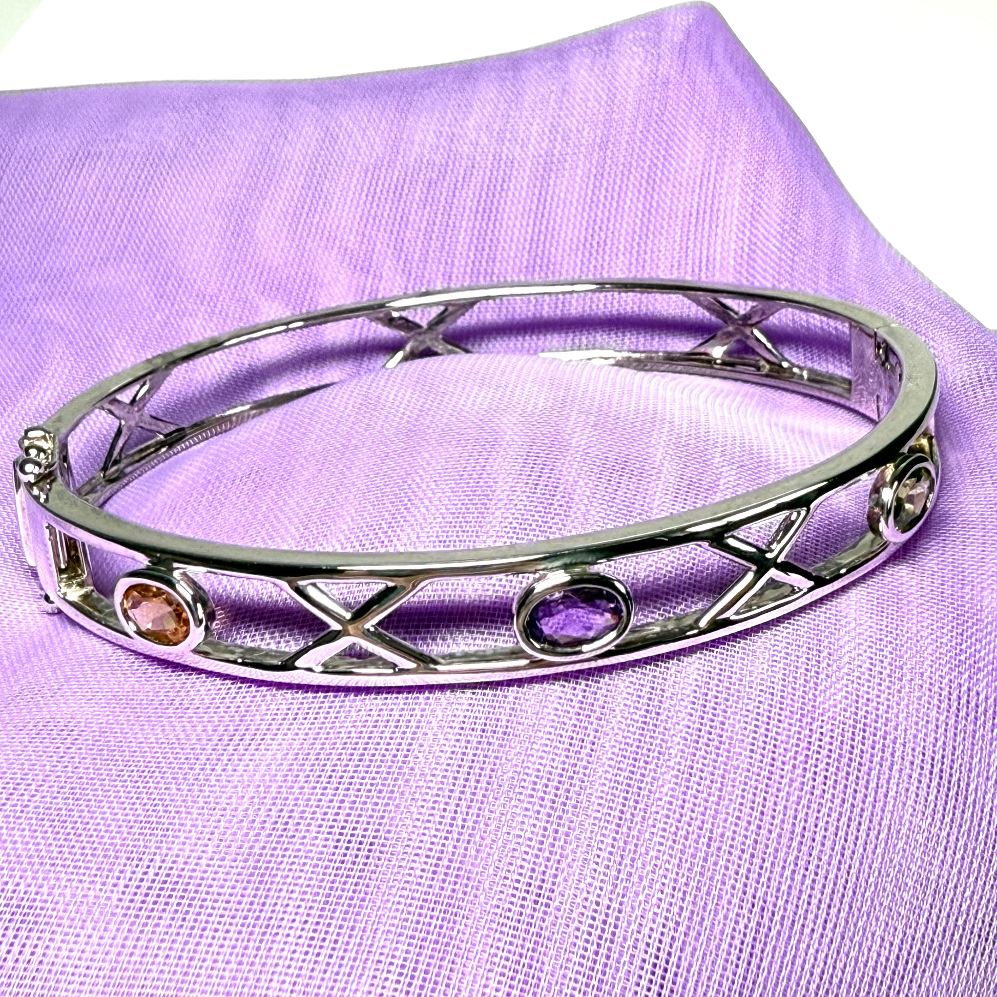 Sterling silver oval real peridot, real amethyst and real citrine, purple, green and yellow open pierced kiss bangle