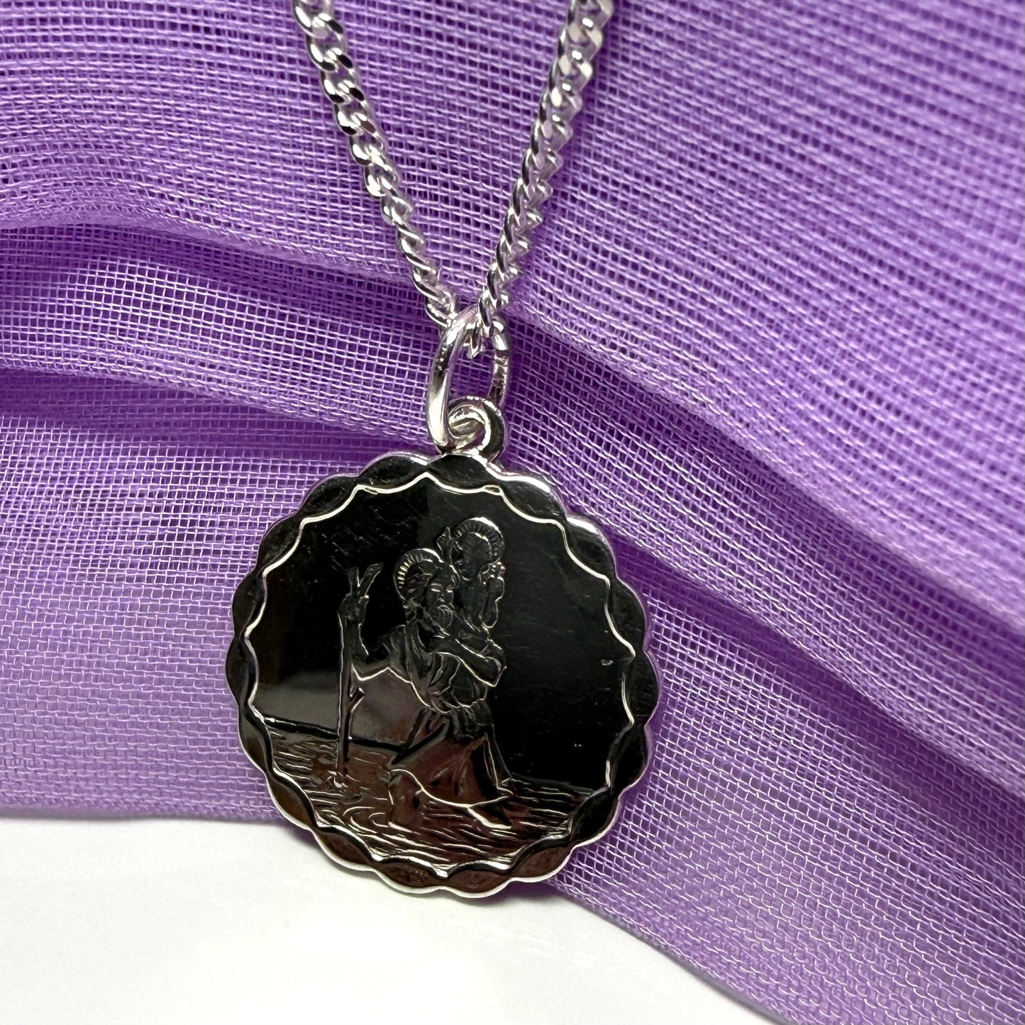 Sterling silver round solid St. Christopher with chain included