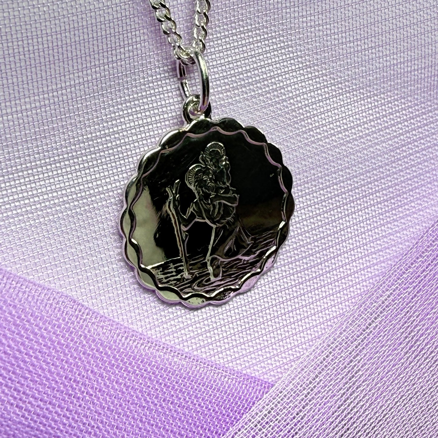 Sterling silver round solid St. Christopher with chain included