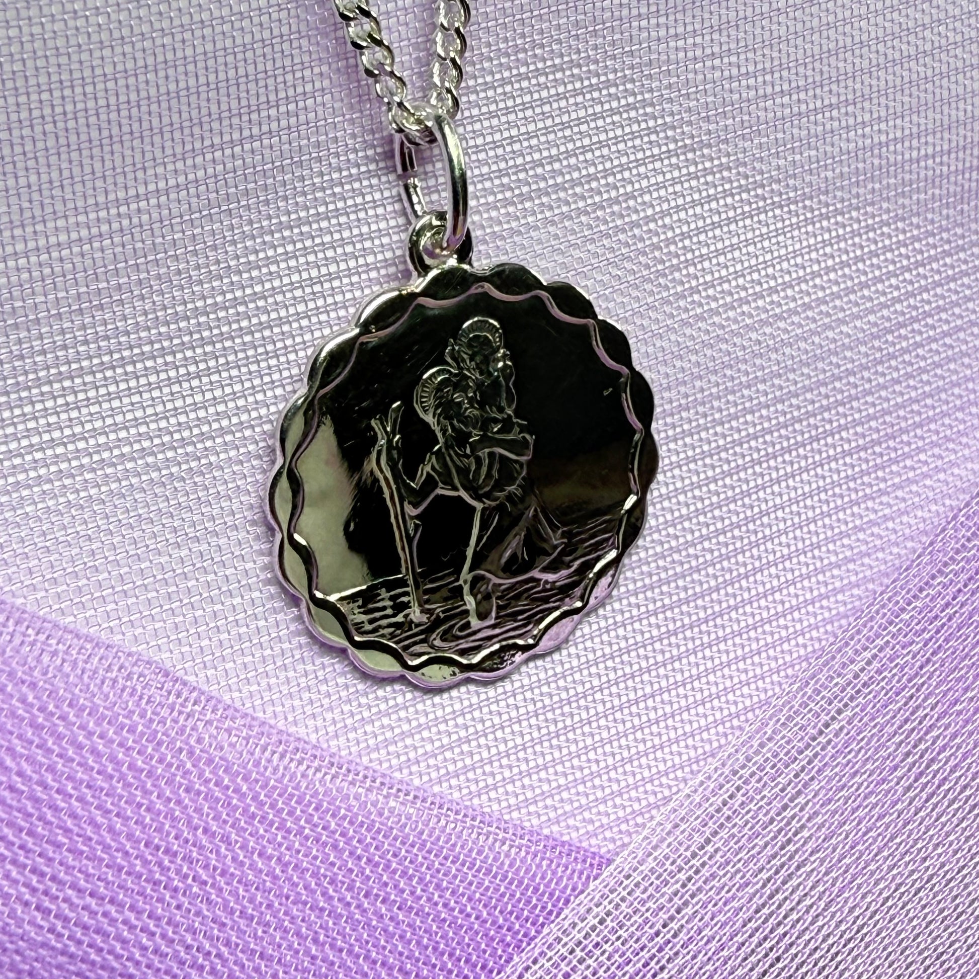 Sterling silver round solid St. Christopher with chain included