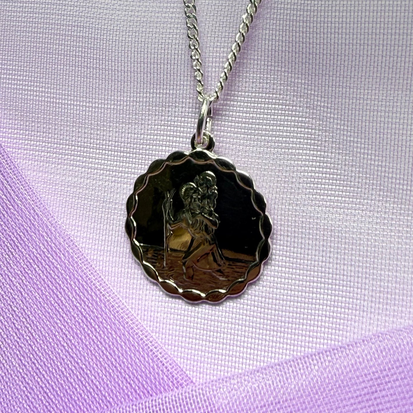 Sterling silver round solid St. Christopher with chain included