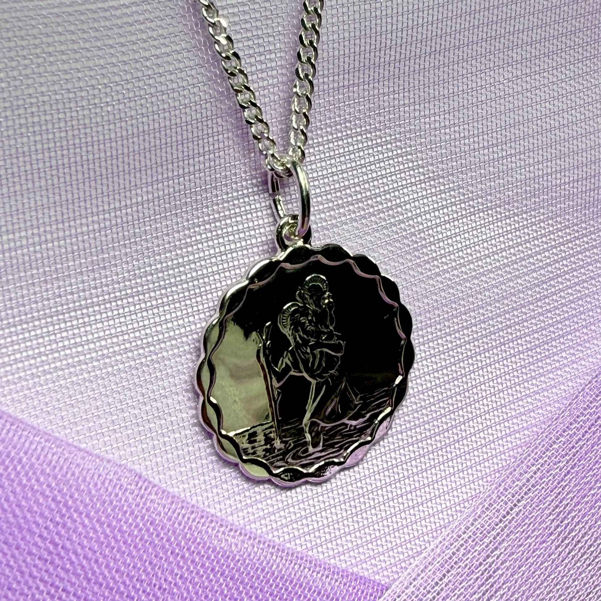 Sterling silver round solid St. Christopher with chain included