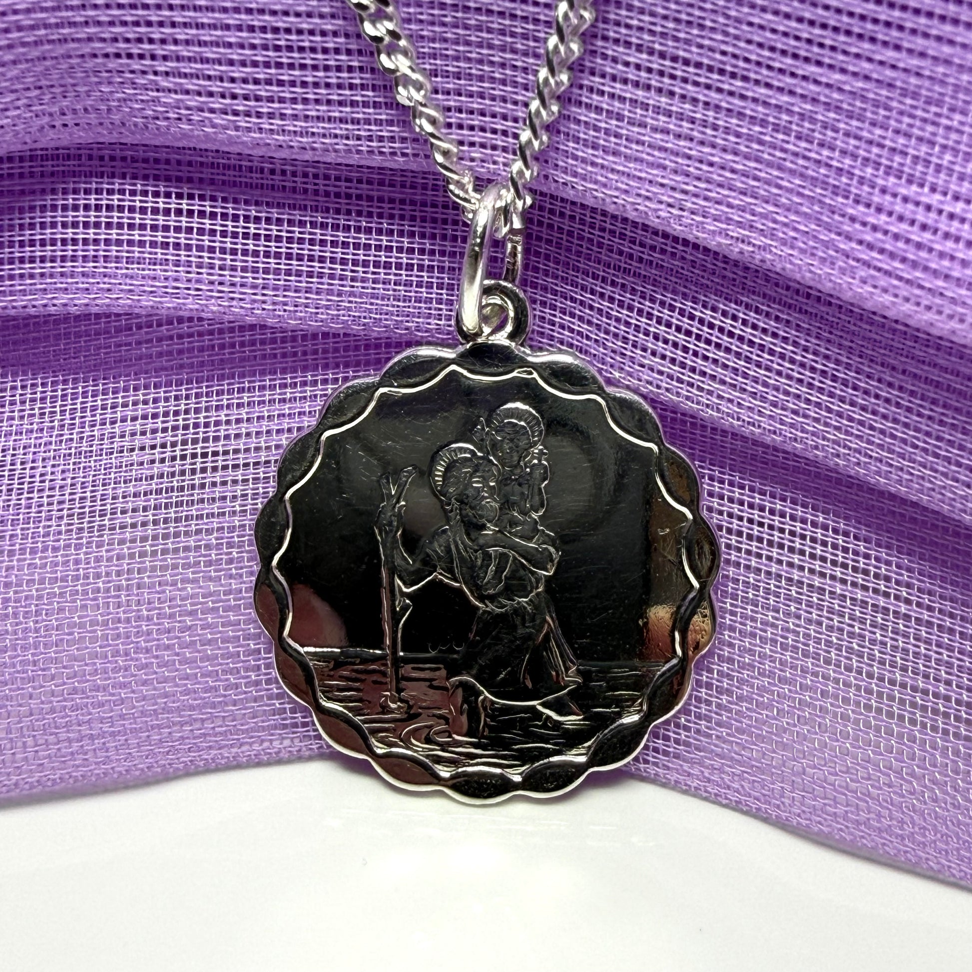 Sterling silver round solid St. Christopher with chain included