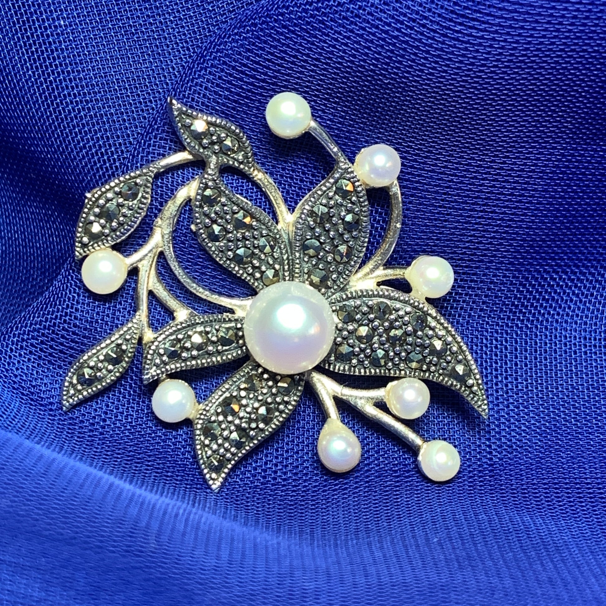 Sterling silver pearl and marcasite flower brooch