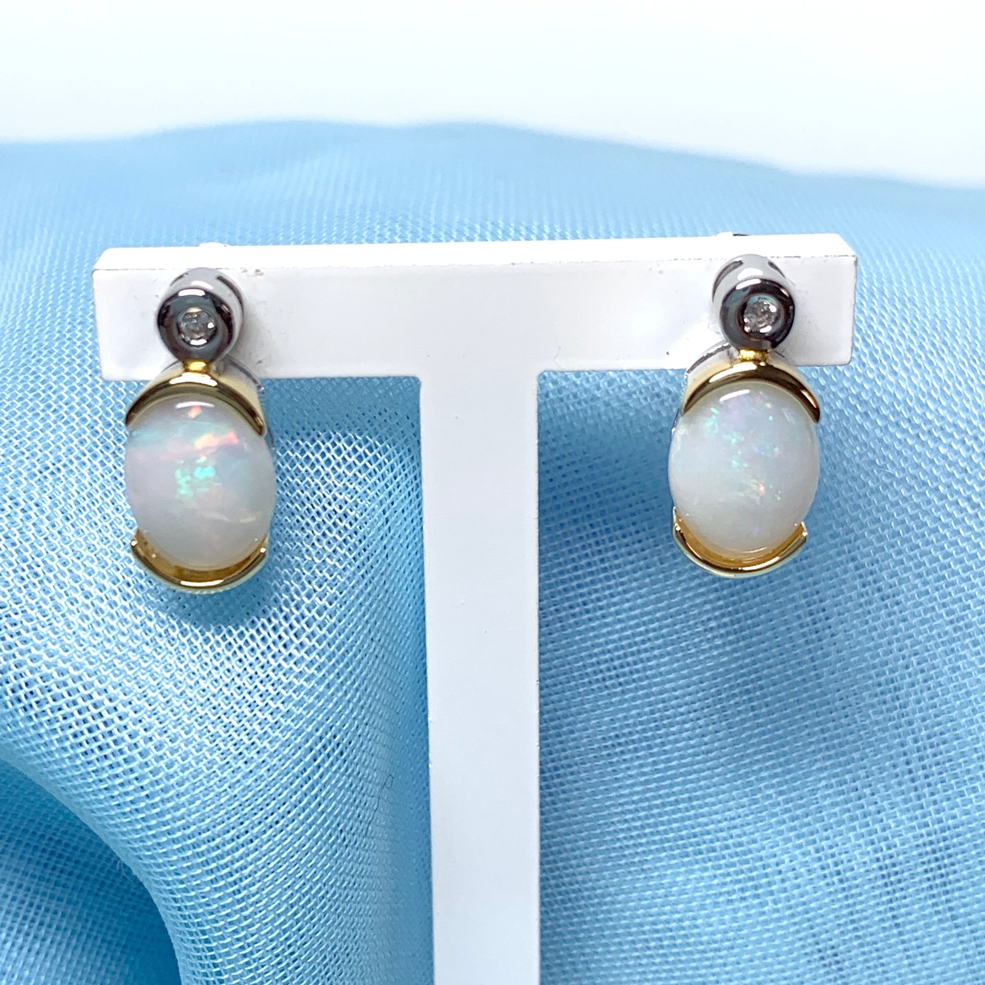Sterling silver real opal oval and cubic zirconia stud earrings
