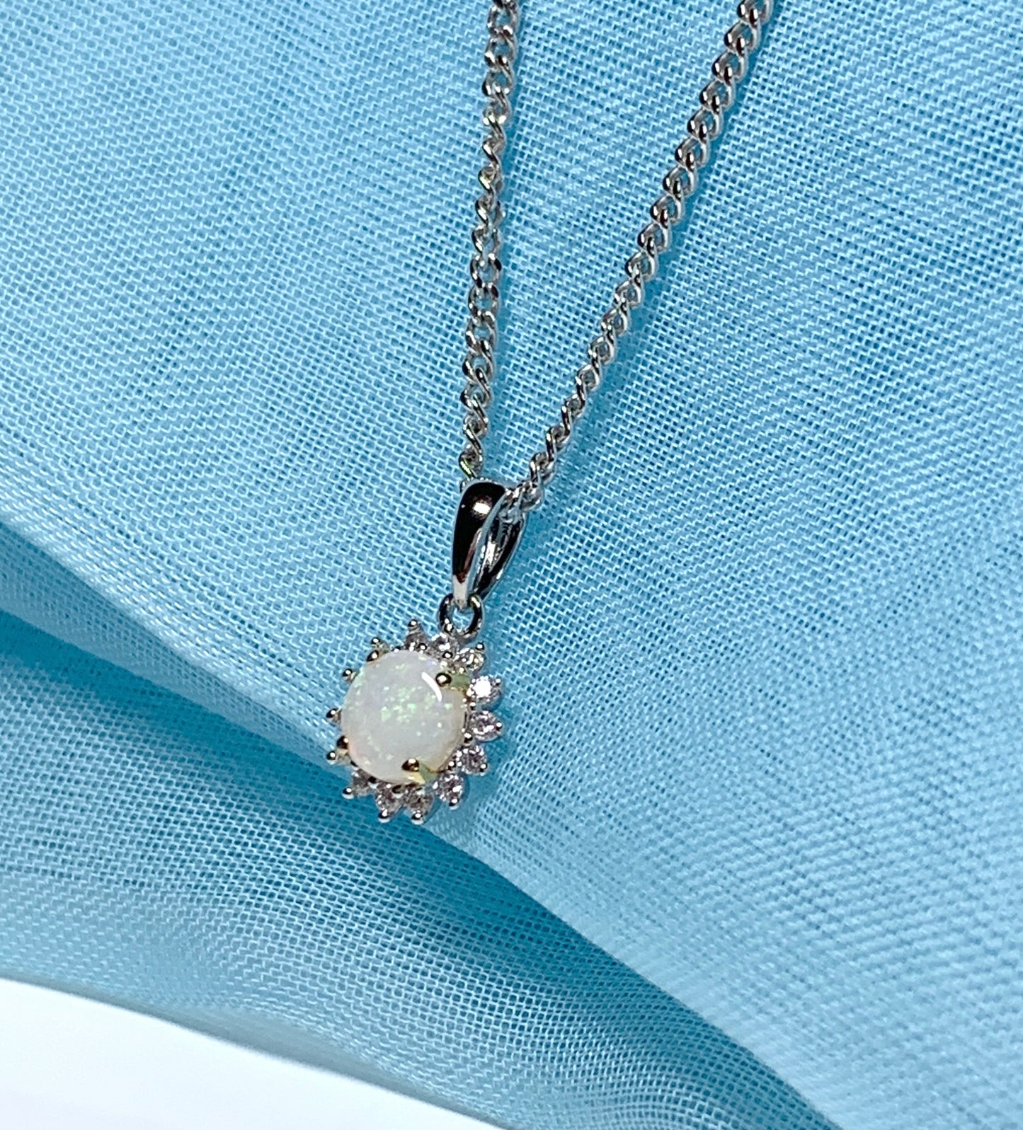 Sterling silver round opal cluster necklace with cubic zirconia pendant