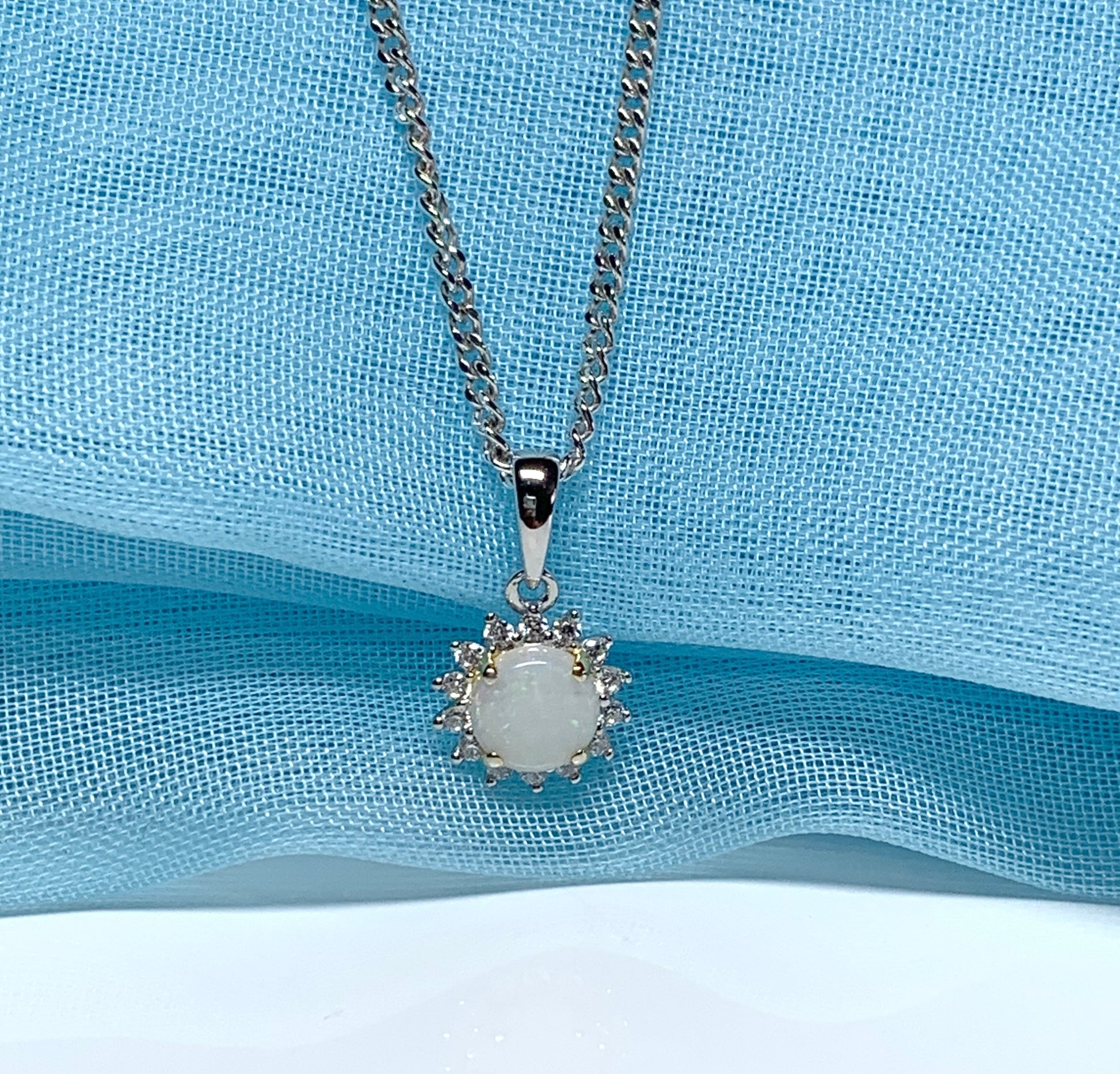 Sterling silver round opal cluster necklace with cubic zirconia pendant