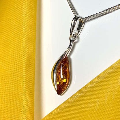 Sterling silver swirl real amber marquise shaped necklace