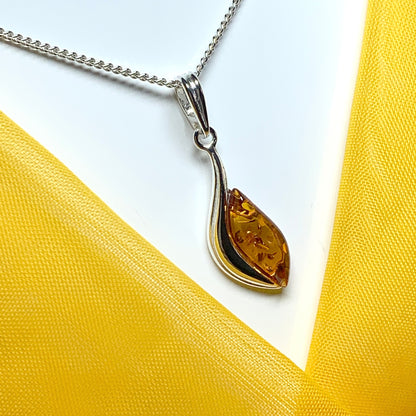 Sterling silver swirl real amber marquise shaped necklace