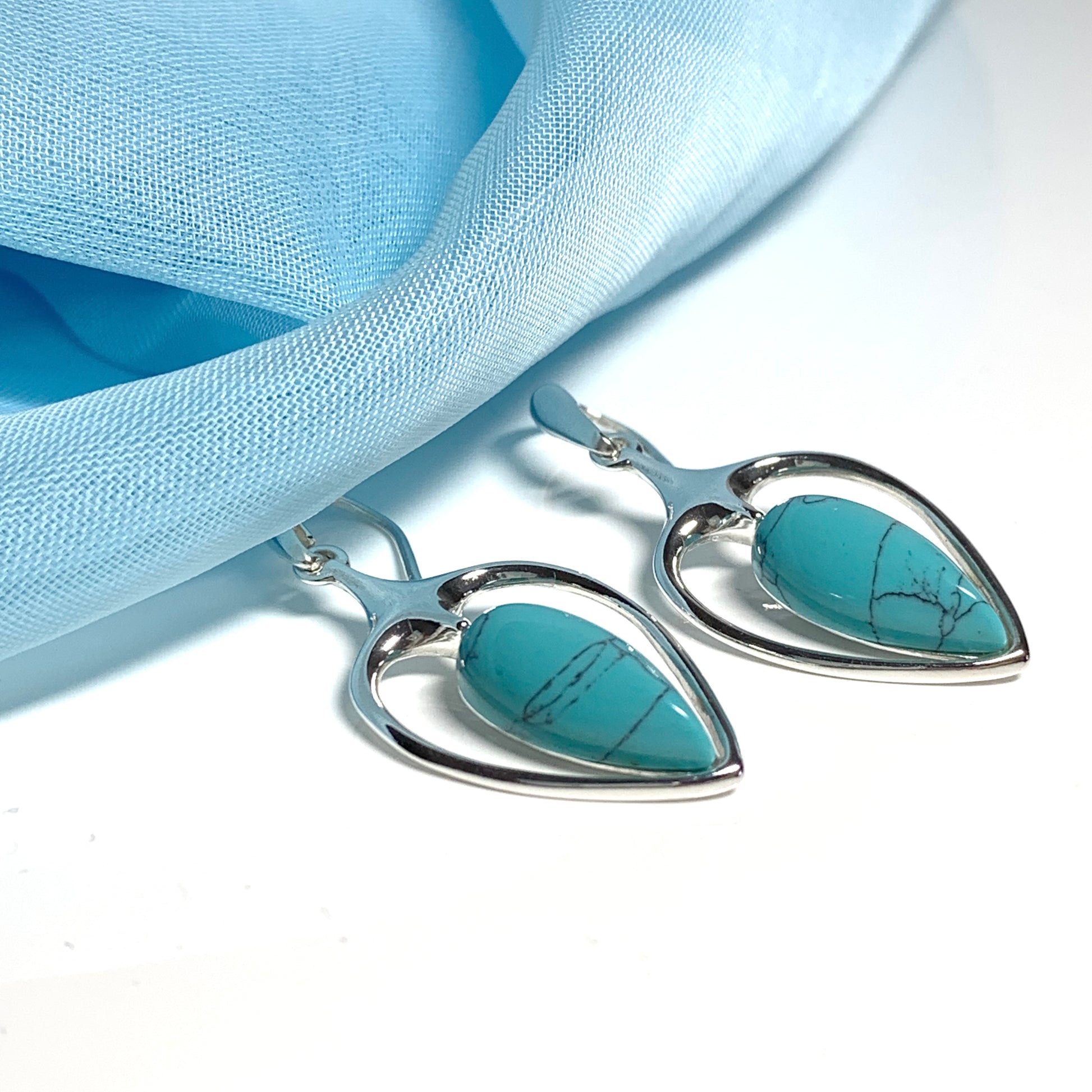 Sterling silver turquoise pear shaped drop earrings