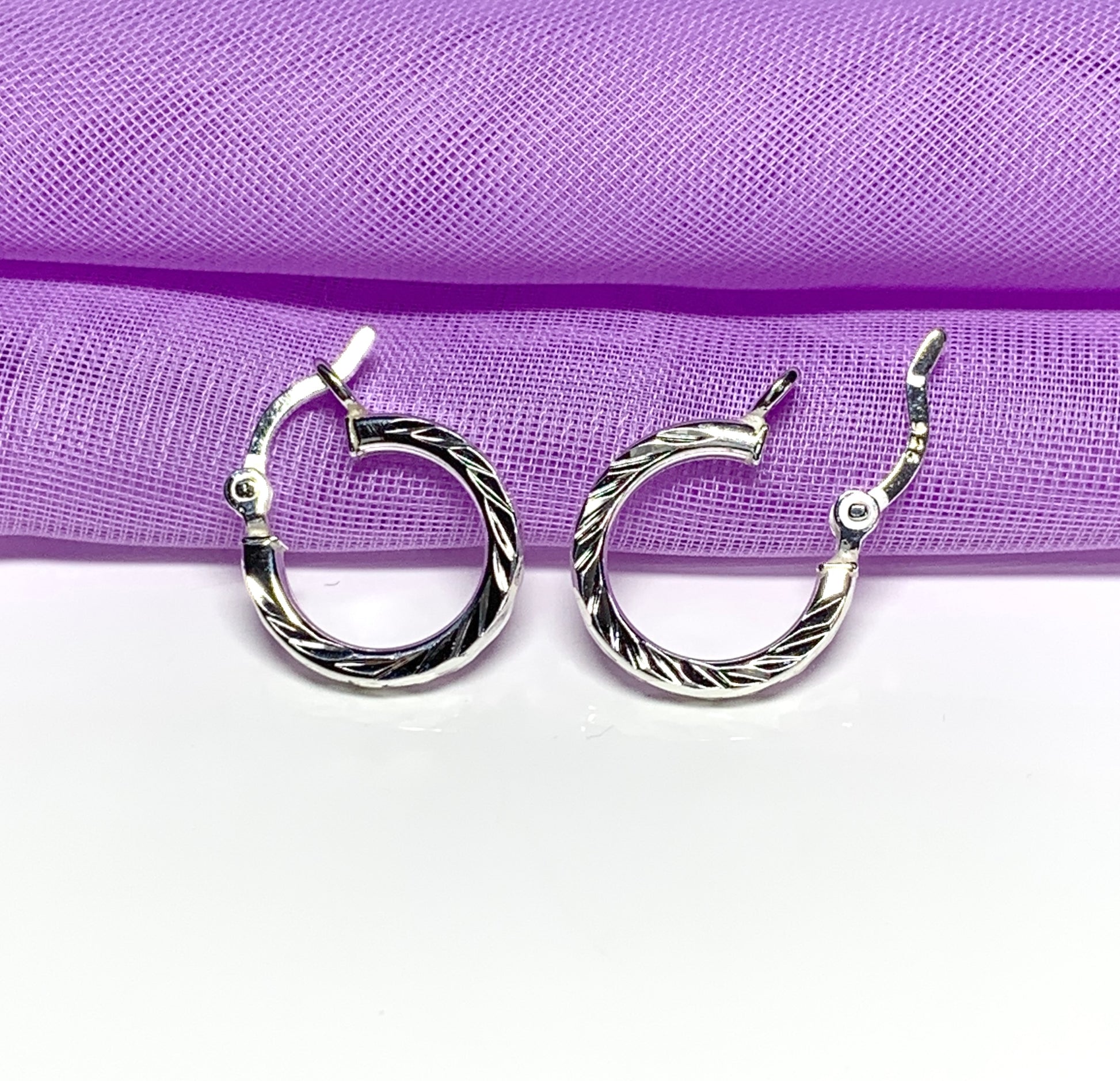 Small sterling silver twisted round hoop diamond cut earrings 14 mm