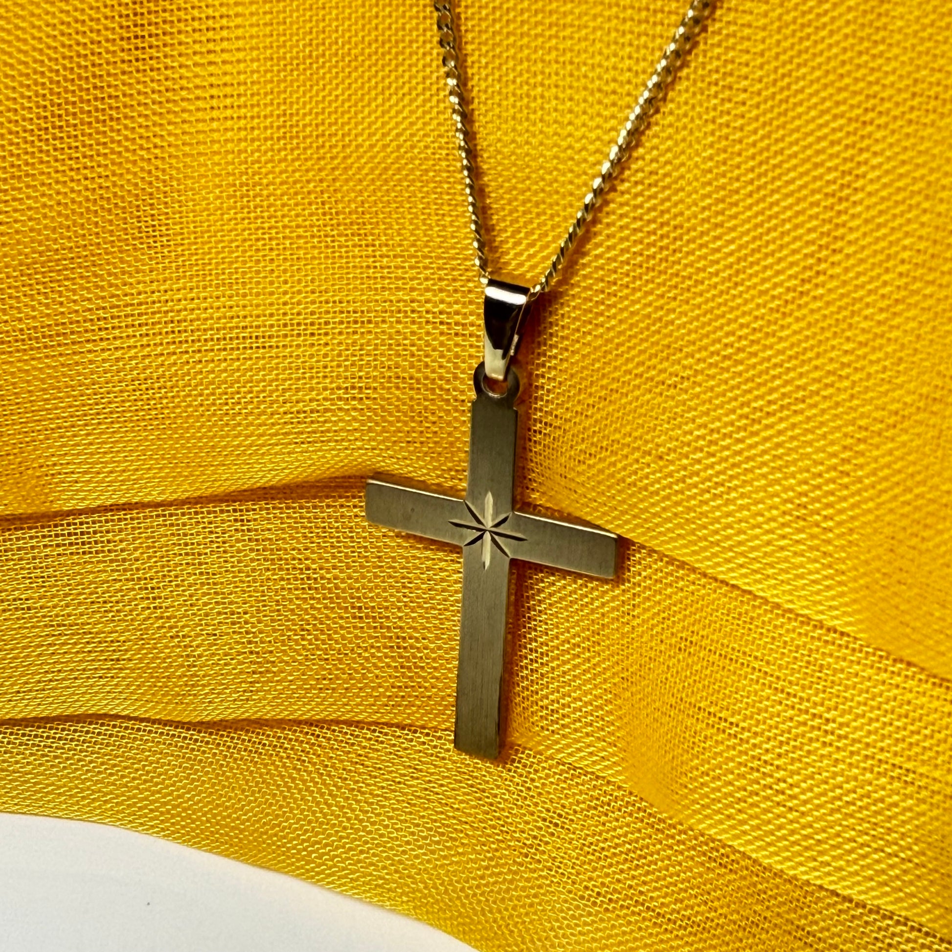 Diamond cut frosted solid yellow gold cross