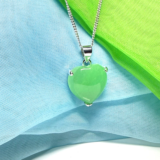 A stunning real green jade necklace heart shaped sterling silver with chain included as well