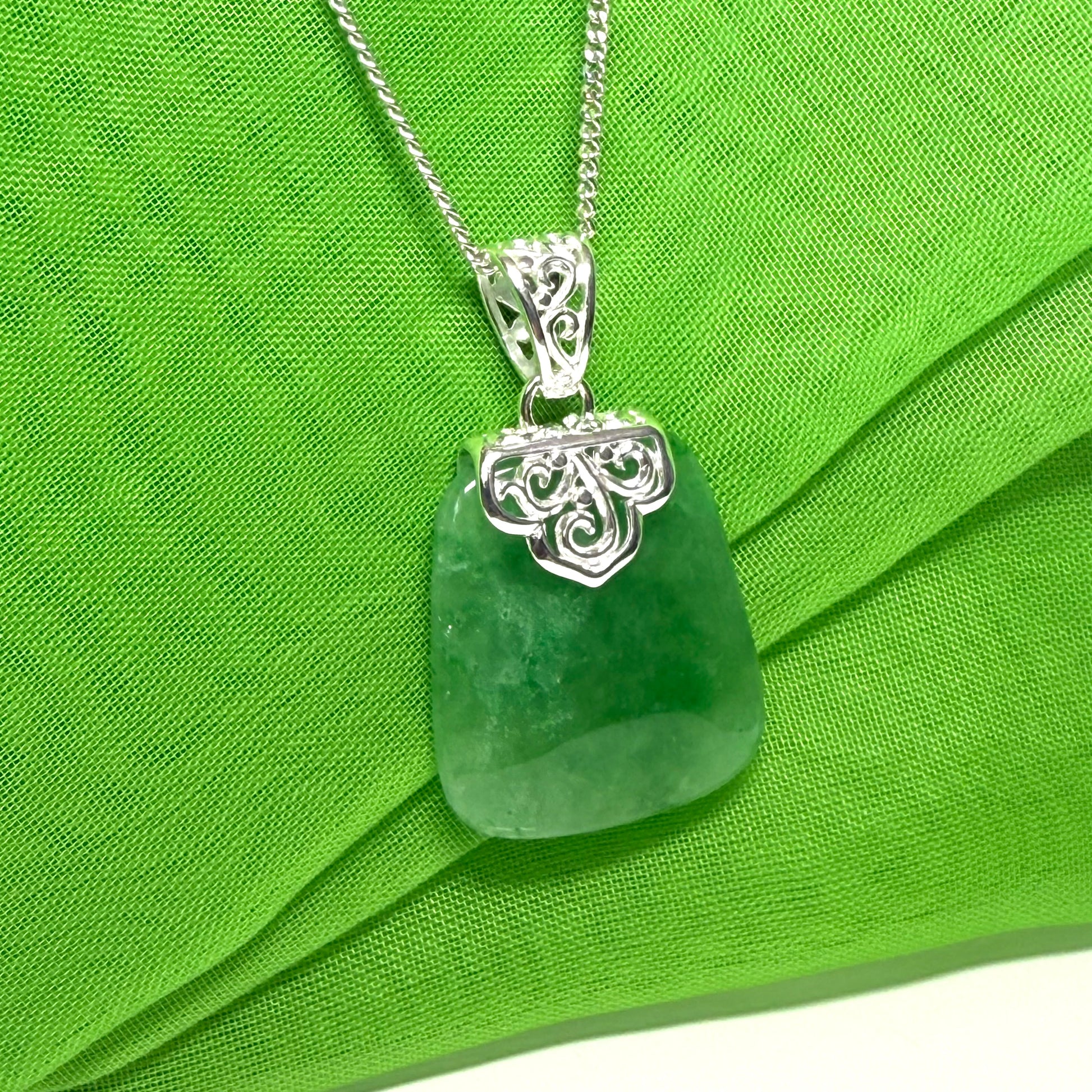 Real green jade necklace large cushion shaped including a solid silver curb chain included sterling silver