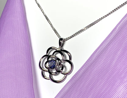 Real tanzanite round swirl necklace made in white gold